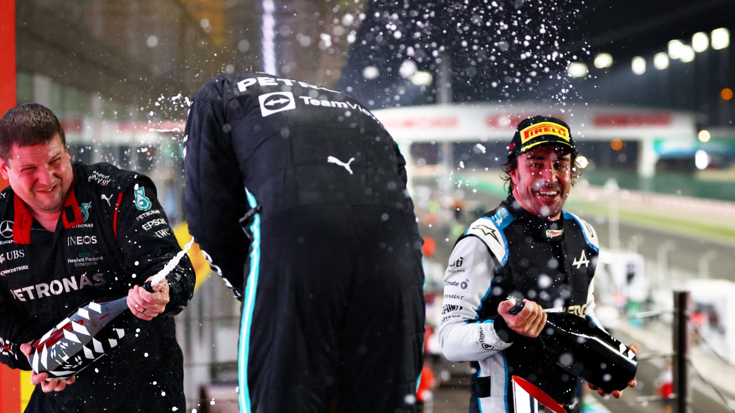 DOHA, QATAR - NOVEMBER 21: Race winner Lewis Hamilton of Great Britain and Mercedes GP and Third