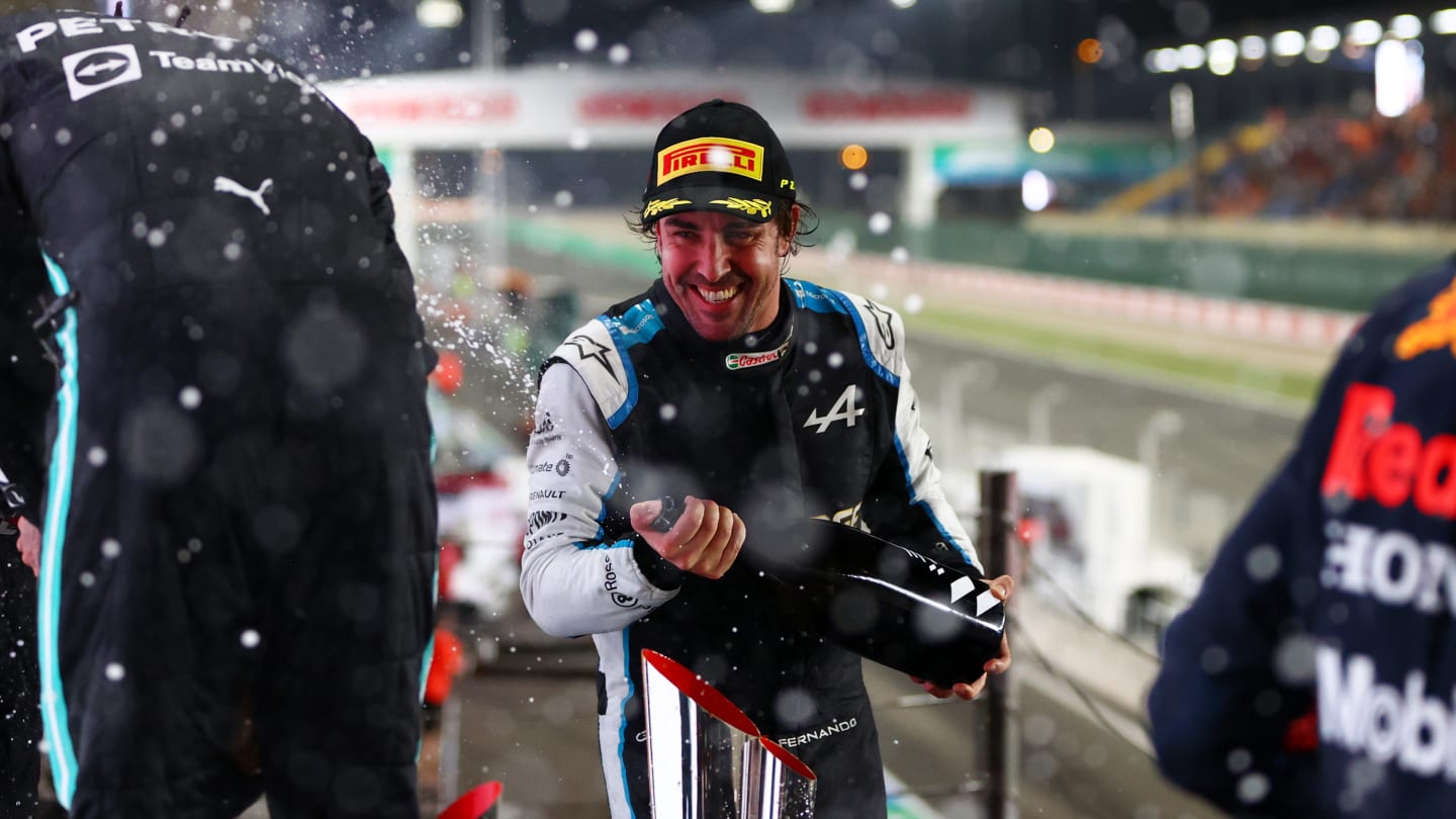 DOHA, QATAR - NOVEMBER 21: Third placed Fernando Alonso of Spain and Alpine F1 Team celebrates on