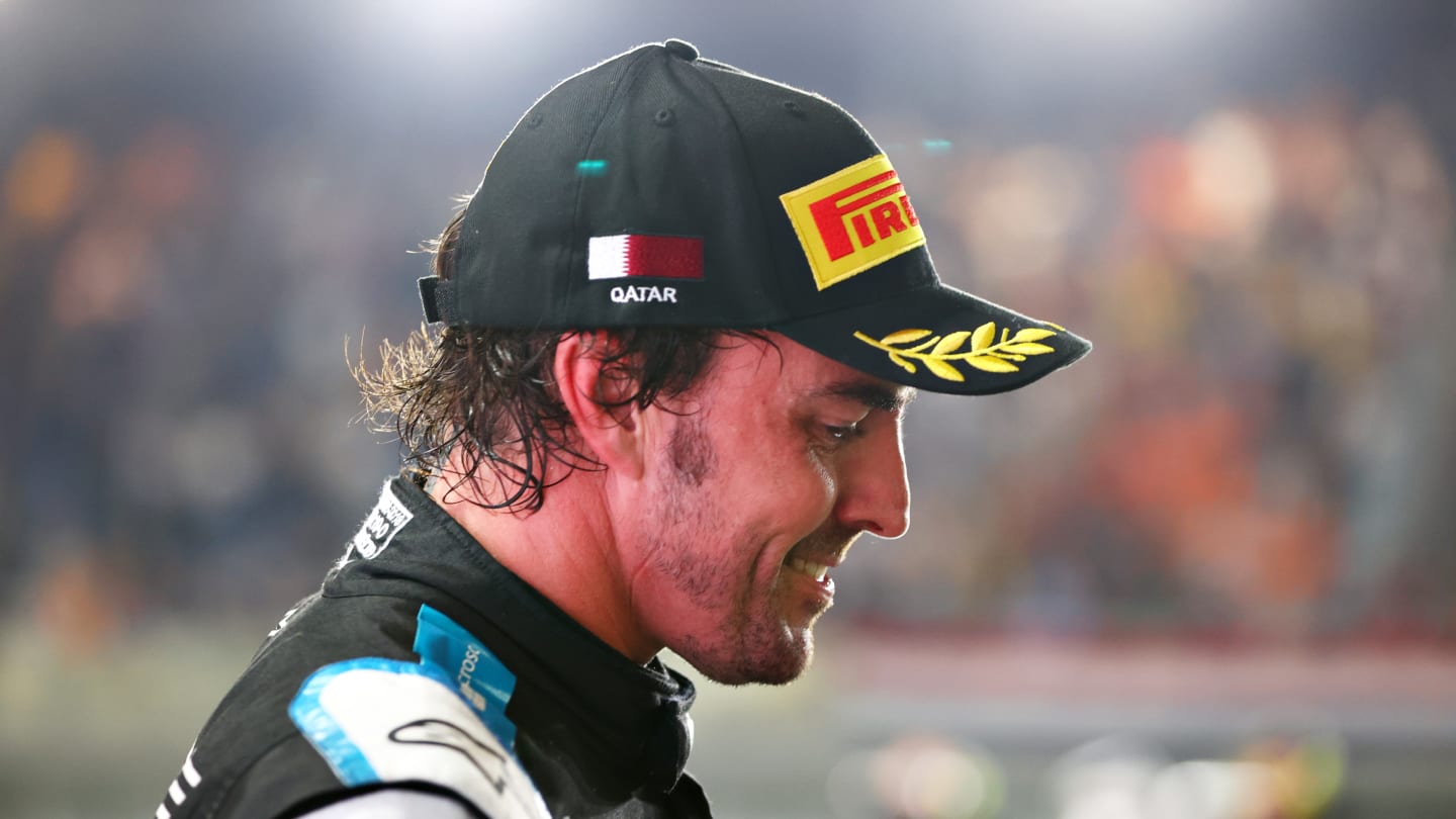 DOHA, QATAR - NOVEMBER 21: Third placed Fernando Alonso of Spain and Alpine F1 Team celebrates on