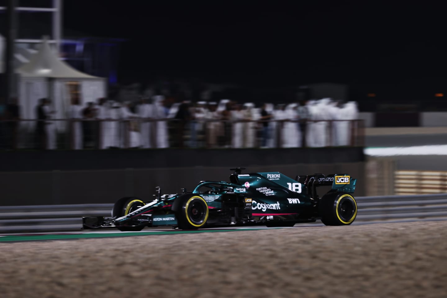 DOHA, QATAR - NOVEMBER 21: Lance Stroll of Canada driving the (18) Aston Martin AMR21 Mercedes during the F1 Grand Prix of Qatar at Losail International Circuit on November 21, 2021 in Doha, Qatar. (Photo by Lars Baron/Getty Images)