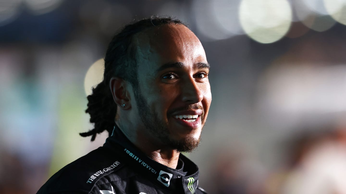DOHA, QATAR - NOVEMBER 21: Race winner Lewis Hamilton of Great Britain and Mercedes GP looks on as he is interviewed in parc ferme during the F1 Grand Prix of Qatar at Losail International Circuit on November 21, 2021 in Doha, Qatar. (Photo by Dan Istitene - Formula 1/Formula 1 via Getty Images)
