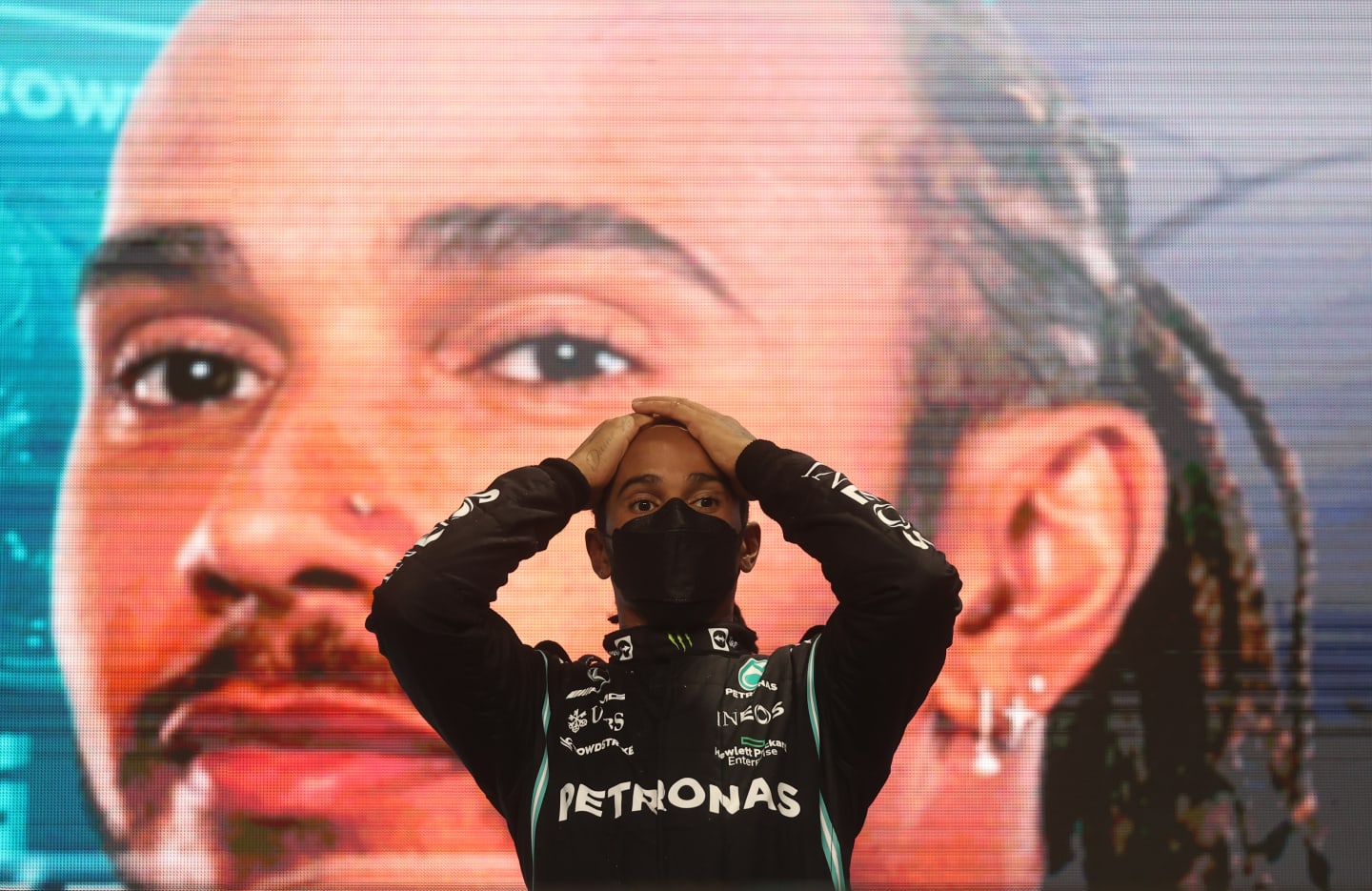 DOHA, QATAR - NOVEMBER 21: Race winner Lewis Hamilton of Great Britain and Mercedes GP celebrates