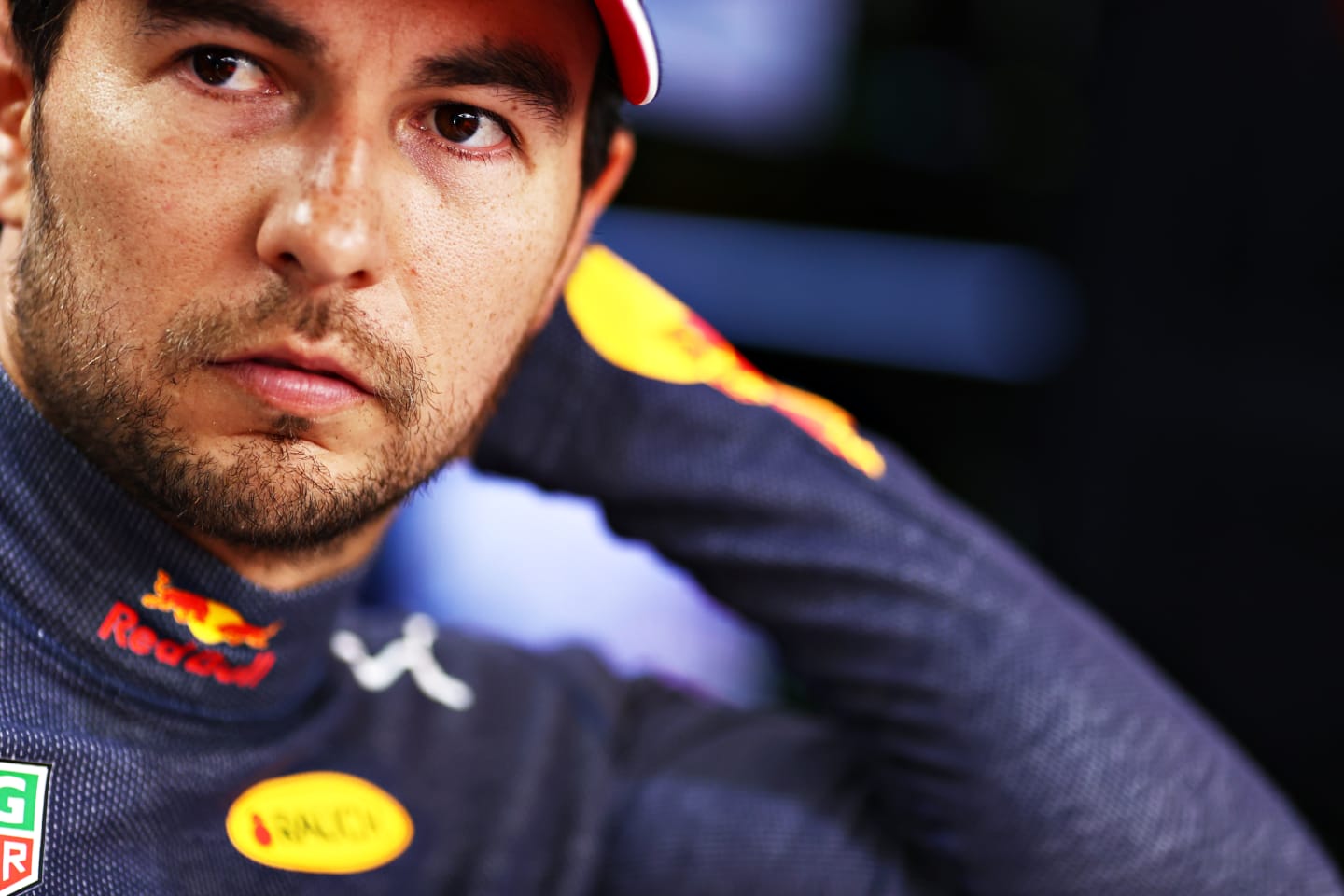 DOHA, QATAR - NOVEMBER 21: Sergio Perez of Mexico and Red Bull Racing prepares to drive in the garage before the F1 Grand Prix of Qatar at Losail International Circuit on November 21, 2021 in Doha, Qatar. (Photo by Mark Thompson/Getty Images)