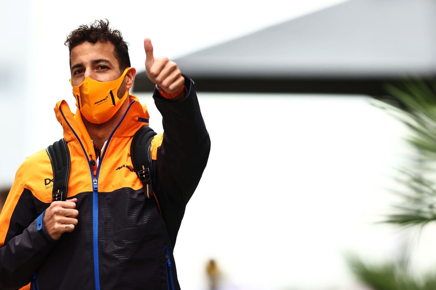 SOCHI, RUSSIA - SEPTEMBER 24: Daniel Ricciardo of Australia and McLaren F1 walks in the Paddock