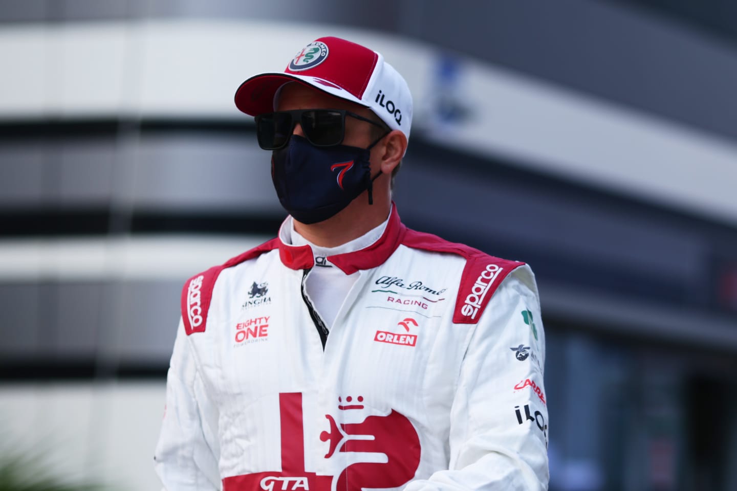SOCHI, RUSSIA - SEPTEMBER 24: Kimi Raikkonen of Finland and Alfa Romeo Racing walks in the Paddock before practice ahead of the F1 Grand Prix of Russia at Sochi Autodrom on September 24, 2021 in Sochi, Russia. (Photo by Peter Fox/Getty Images)