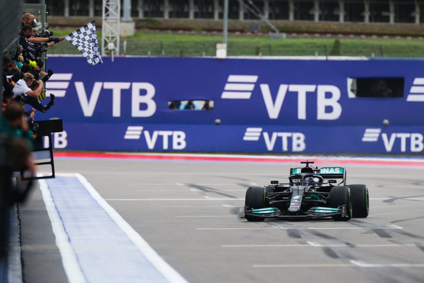 SOCHI, RUSSIA - SEPTEMBER 26: Lewis Hamilton of Mercedes and Great Britain wins his 100th Grand Prix during the F1 Grand Prix of Russia at Sochi Autodrom on September 26, 2021 in Sochi, Russia. (Photo by Peter Fox/Getty Images)