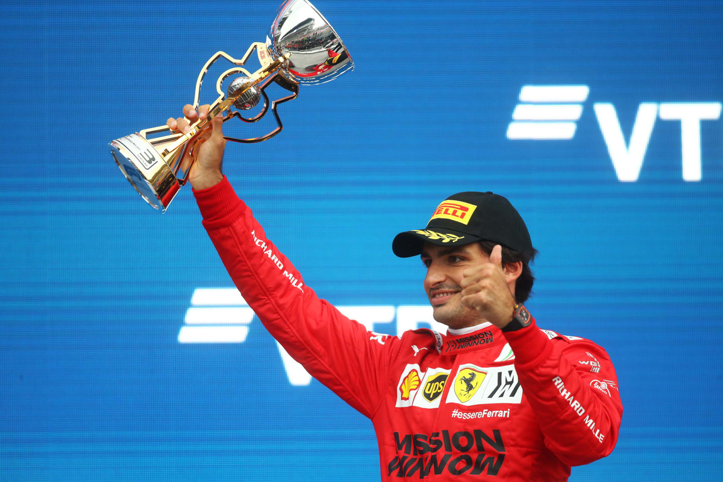 SOCHI, RUSSIA - SEPTEMBER 26: Third placed Carlos Sainz of Spain and Ferrari celebrates on the podium during the F1 Grand Prix of Russia at Sochi Autodrom on September 26, 2021 in Sochi, Russia. (Photo by Mark Thompson/Getty Images)