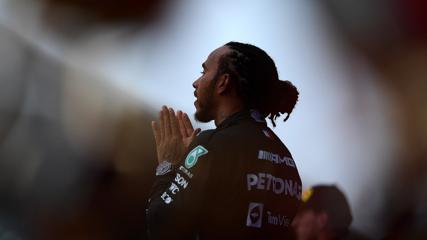 SOCHI, RUSSIA - SEPTEMBER 26: Race winner Lewis Hamilton of Great Britain and Mercedes GP celebrates on the podium during the F1 Grand Prix of Russia at Sochi Autodrom on September 26, 2021 in Sochi, Russia. (Photo by Mario Renzi - Formula 1/Formula 1 via Getty Images)