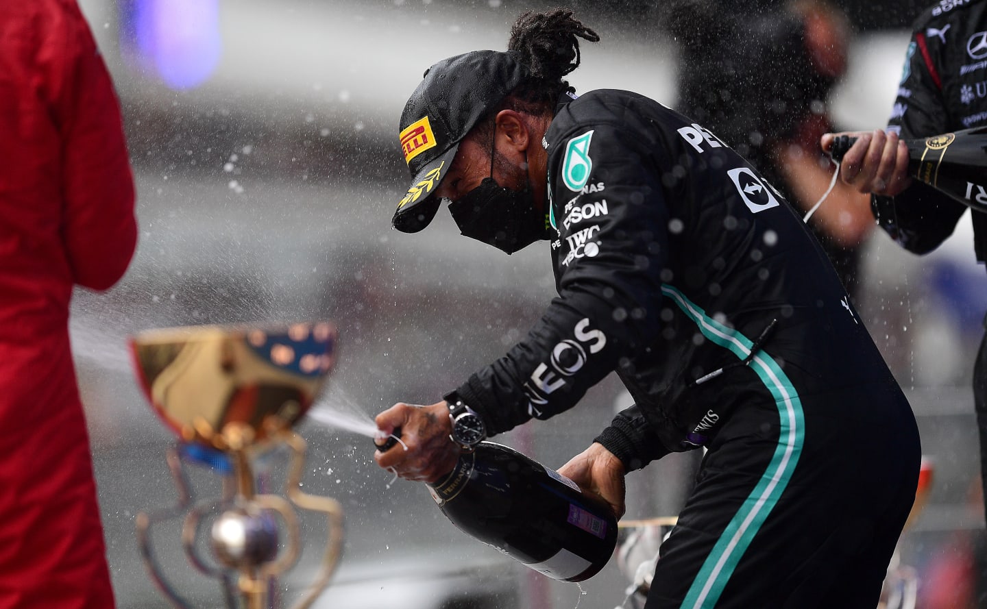 SOCHI, RUSSIA - SEPTEMBER 26: Race winner Lewis Hamilton of Great Britain and Mercedes GP celebrates on the podium during the F1 Grand Prix of Russia at Sochi Autodrom on September 26, 2021 in Sochi, Russia. (Photo by Mario Renzi - Formula 1/Formula 1 via Getty Images)
