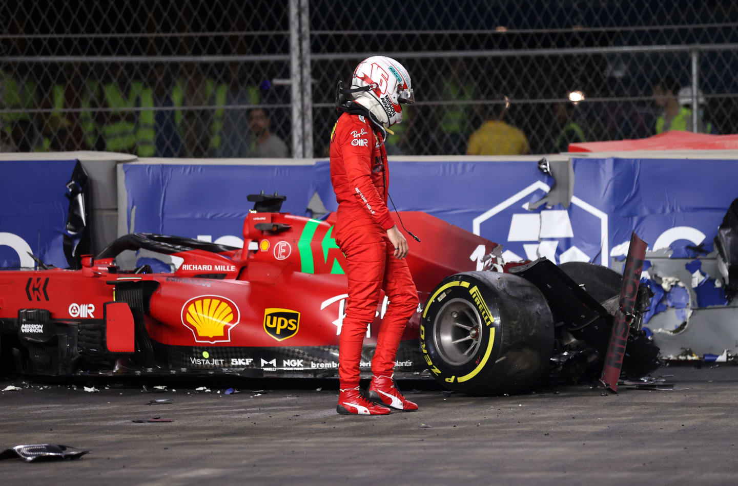 JEDDAH, SAUDI ARABIA - DECEMBER 03: Charles Leclerc of Monaco and Ferrari looks at his car after crashing during practice ahead of the F1 Grand Prix of Saudi Arabia at Jeddah Corniche Circuit on December 03, 2021 in Jeddah, Saudi Arabia. (Photo by Lars Baron/Getty Images)