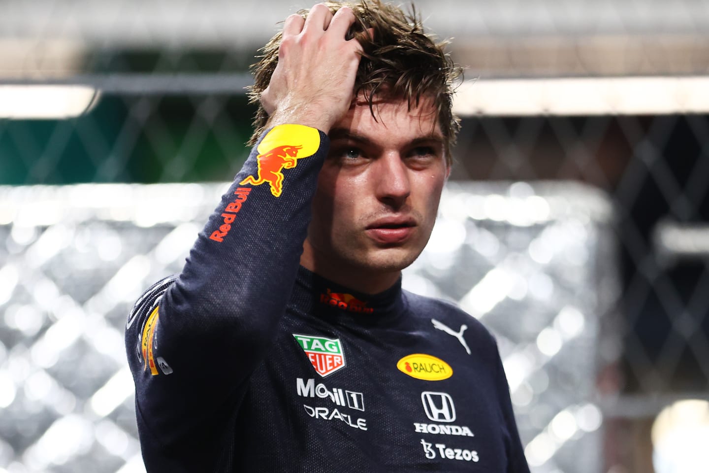 JEDDAH, SAUDI ARABIA - DECEMBER 04: Third place qualifier Max Verstappen of Netherlands and Red Bull Racing looks on in parc ferme during qualifying ahead of the F1 Grand Prix of Saudi Arabia at Jeddah Corniche Circuit on December 04, 2021 in Jeddah, Saudi Arabia. (Photo by Bryn Lennon - Formula 1/Formula 1 via Getty Images)