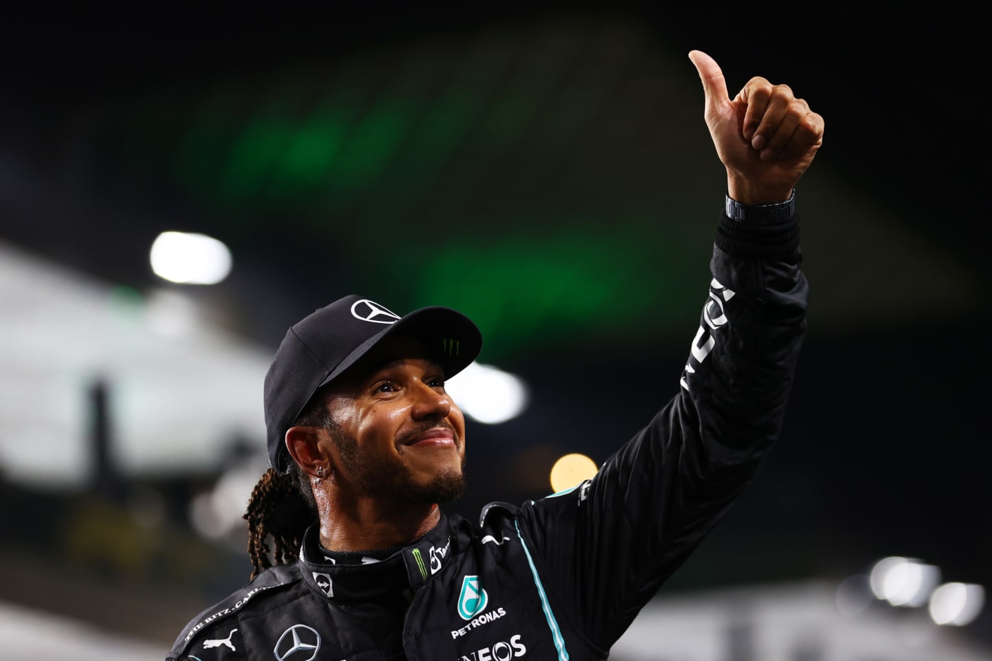 JEDDAH, SAUDI ARABIA - DECEMBER 04: Pole position qualifier Lewis Hamilton of Great Britain and Mercedes GP celebrates in parc ferme during qualifying ahead of the F1 Grand Prix of Saudi Arabia at Jeddah Corniche Circuit on December 04, 2021 in Jeddah, Saudi Arabia. (Photo by Bryn Lennon - Formula 1/Formula 1 via Getty Images)
