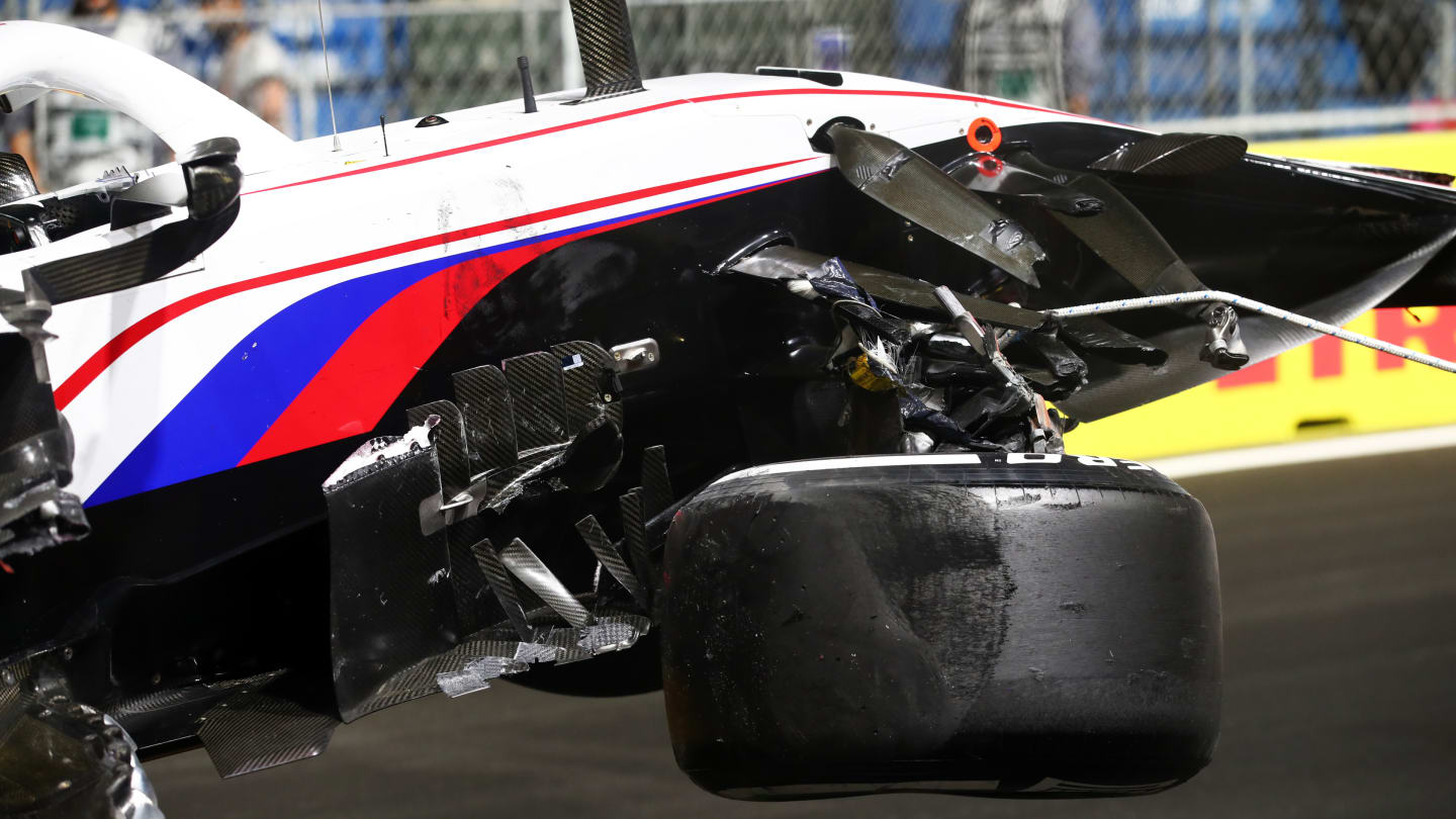 JEDDAH, SAUDI ARABIA - DECEMBER 05: The car of Nikita Mazepin of Russia and Haas F1 is removed from the track after a crash during the F1 Grand Prix of Saudi Arabia at Jeddah Corniche Circuit on December 05, 2021 in Jeddah, Saudi Arabia. (Photo by Joe Portlock - Formula 1/Formula 1 via Getty Images)