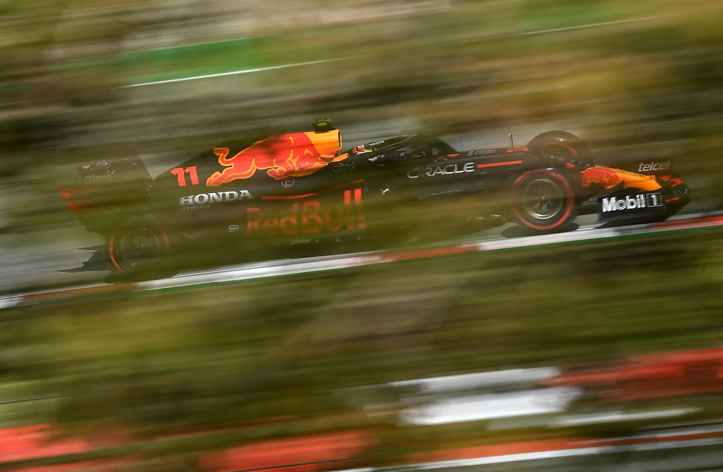 BARCELONA, SPAIN - MAY 07: Sergio Perez of Mexico driving the (11) Red Bull Racing RB16B Honda during practice for the F1 Grand Prix of Spain at Circuit de Barcelona-Catalunya on May 07, 2021 in Barcelona, Spain. (Photo by Clive Mason - Formula 1/Formula 1 via Getty Images)