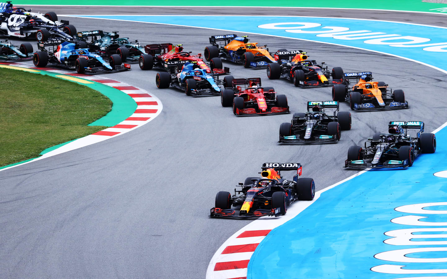 BARCELONA, SPAIN - MAY 09: Max Verstappen of the Netherlands driving the (33) Red Bull Racing RB16B Honda leads the field during the F1 Grand Prix of Spain at Circuit de Barcelona-Catalunya on May 09, 2021 in Barcelona, Spain. (Photo by Bryn Lennon/Getty Images)