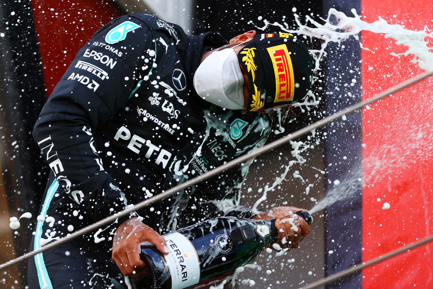 BARCELONA, SPAIN - MAY 09:  Lewis Hamilton of Great Britain  Mercedes AMG Petronas celebrates on the podium after winning the F1 Grand Prix of Spain at Circuit de Barcelona-Catalunya on May 09, 2021 in Barcelona, Spain. (Photo by Dan Istitene - Formula 1/Formula 1 via Getty Images)