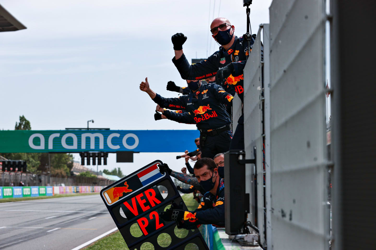 BARCELONA, SPAIN - MAY 09: The Red Bull Racing team celebrate the second place finish of Max