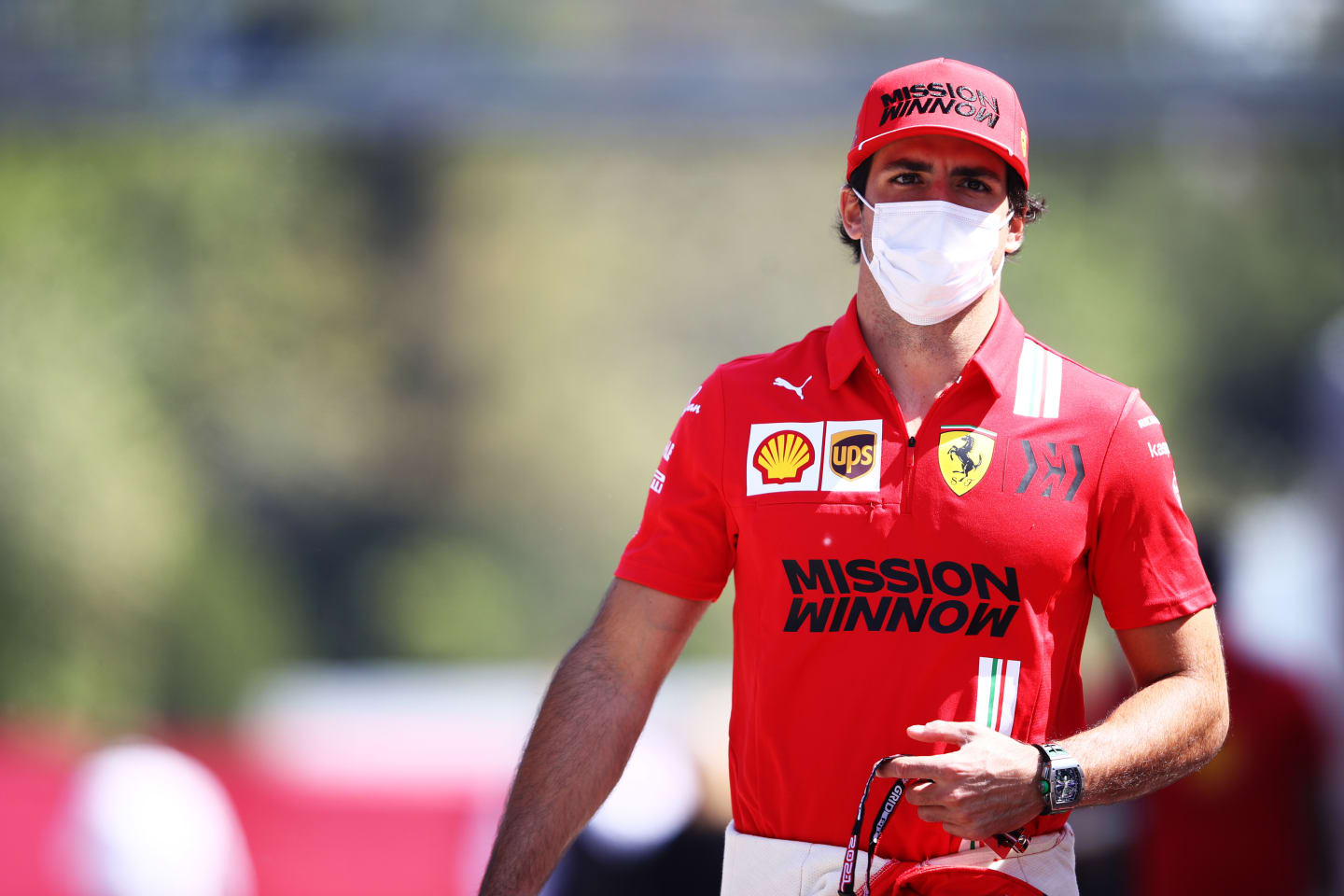 BARCELONA, SPAIN - MAY 06: Carlos Sainz of Spain and Ferrari walks in the Paddock during previews