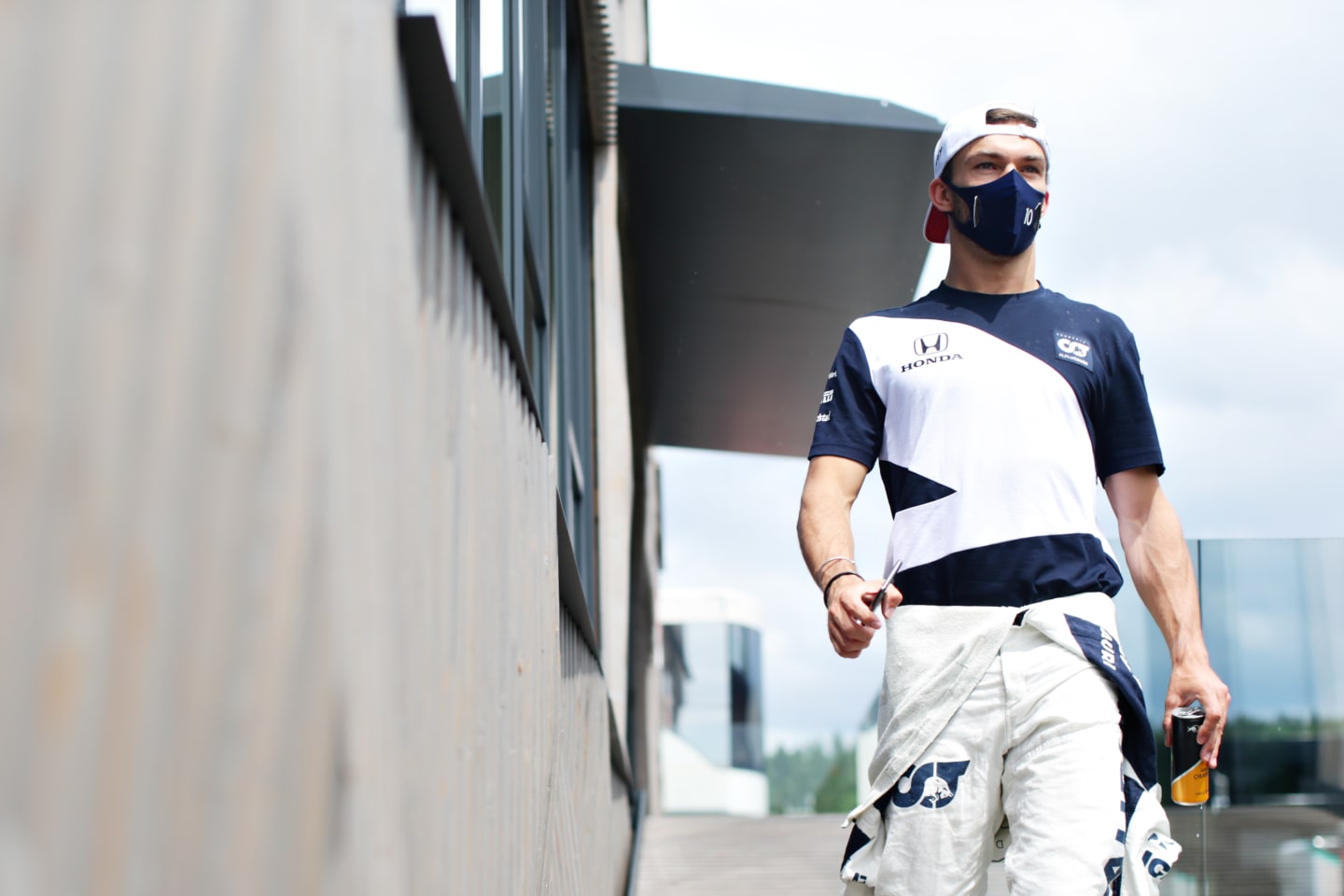 SPIELBERG, AUSTRIA - JUNE 25: Pierre Gasly of France and Scuderia AlphaTauri walks in the Paddock during practice ahead of the F1 Grand Prix of Styria at Red Bull Ring on June 25, 2021 in Spielberg, Austria. (Photo by Peter Fox/Getty Images)