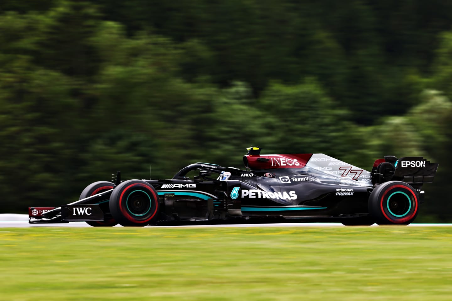 SPIELBERG, AUSTRIA - JUNE 25: Valtteri Bottas of Finland driving the (77) Mercedes AMG Petronas F1 Team Mercedes W12 on track during practice ahead of the F1 Grand Prix of Styria at Red Bull Ring on June 25, 2021 in Spielberg, Austria. (Photo by Clive Rose/Getty Images)