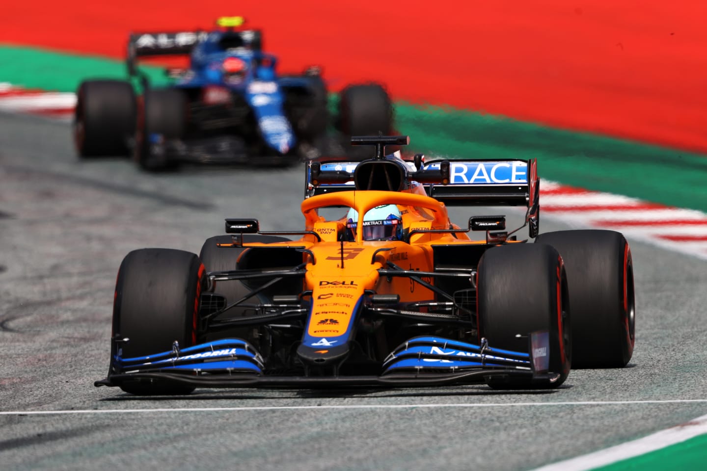 SPIELBERG, AUSTRIA - JUNE 25: Daniel Ricciardo of Australia driving the (3) McLaren F1 Team MCL35M Mercedes leads Esteban Ocon of France driving the (31) Alpine A521 Renault on track during practice ahead of the F1 Grand Prix of Styria at Red Bull Ring on June 25, 2021 in Spielberg, Austria. (Photo by Bryn Lennon/Getty Images)
