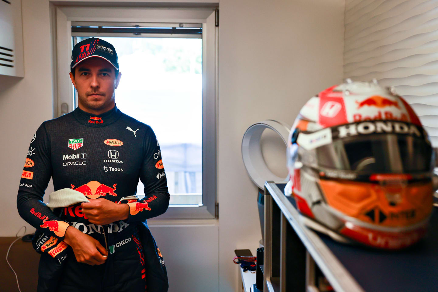 SPIELBERG, AUSTRIA - JUNE 26: Sergio Perez of Mexico and Red Bull Racing prepares to drive during