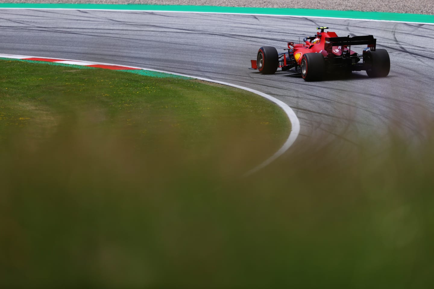 SPIELBERG, AUSTRIA - JUNE 26: Carlos Sainz of Spain driving the (55) Scuderia Ferrari SF21 on track during final practice ahead of the F1 Grand Prix of Styria at Red Bull Ring on June 26, 2021 in Spielberg, Austria. (Photo by Bryn Lennon/Getty Images)