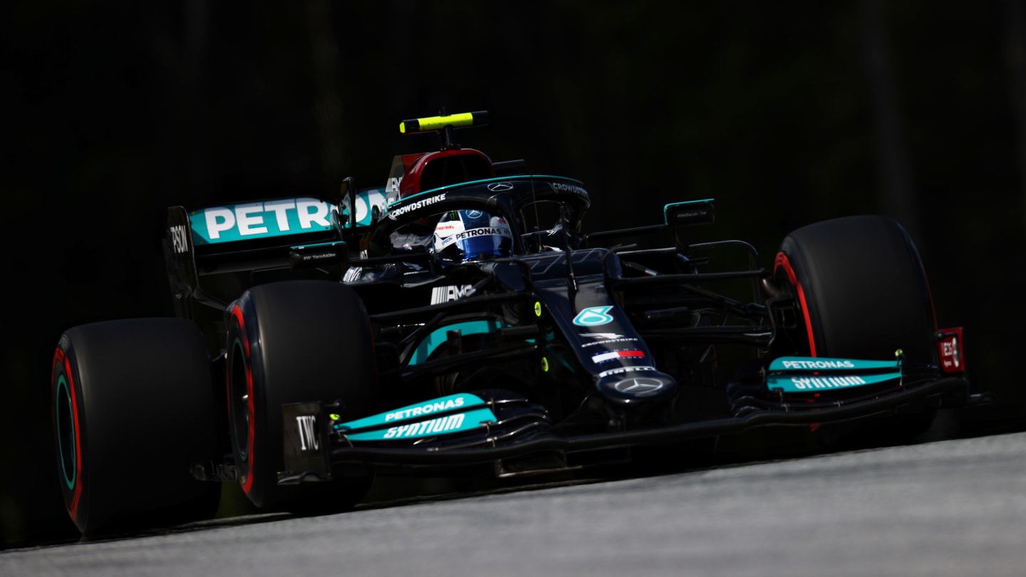 SPIELBERG, AUSTRIA - JUNE 26: Valtteri Bottas of Finland driving the (77) Mercedes AMG Petronas F1 Team Mercedes W12 during qualifying ahead of the F1 Grand Prix of Styria at Red Bull Ring on June 26, 2021 in Spielberg, Austria. (Photo by Clive Mason - Formula 1/Formula 1 via Getty Images)