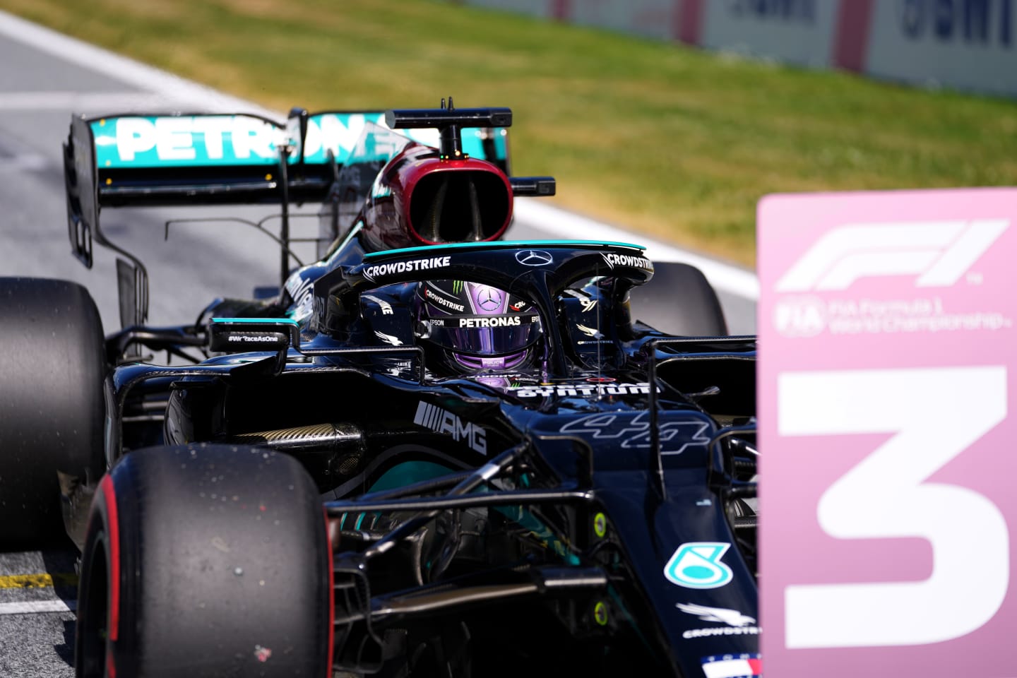 SPIELBERG, AUSTRIA - JUNE 26: Third place qualifier Lewis Hamilton of Great Britain and Mercedes GP stops in parc ferme during qualifying ahead of the F1 Grand Prix of Styria at Red Bull Ring on June 26, 2021 in Spielberg, Austria. (Photo by Darko Vojinovic - Pool/Getty Images)