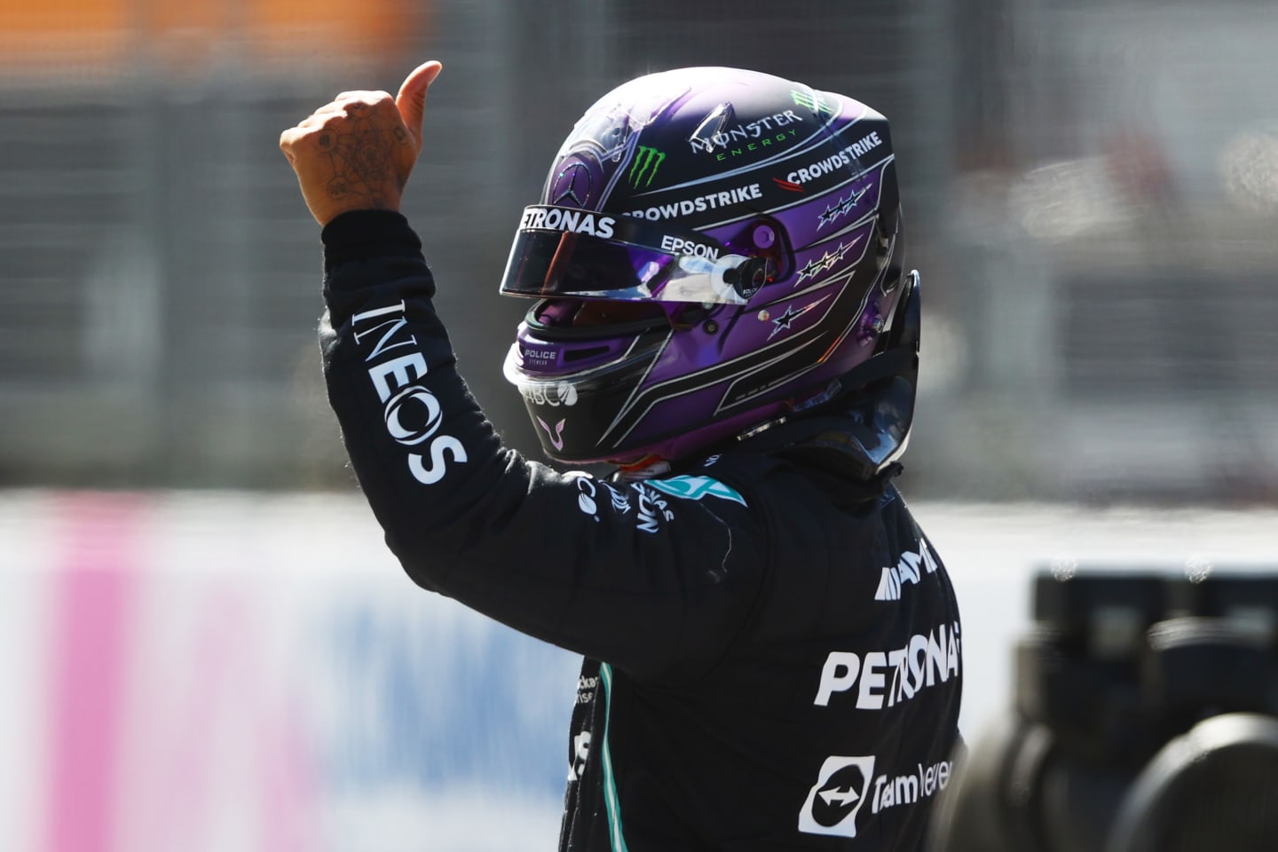 SPIELBERG, AUSTRIA - JUNE 26: Third place qualifier Lewis Hamilton of Great Britain and Mercedes GP waves to the crowd from parc ferme during qualifying ahead of the F1 Grand Prix of Styria at Red Bull Ring on June 26, 2021 in Spielberg, Austria. (Photo by Bryn Lennon/Getty Images)