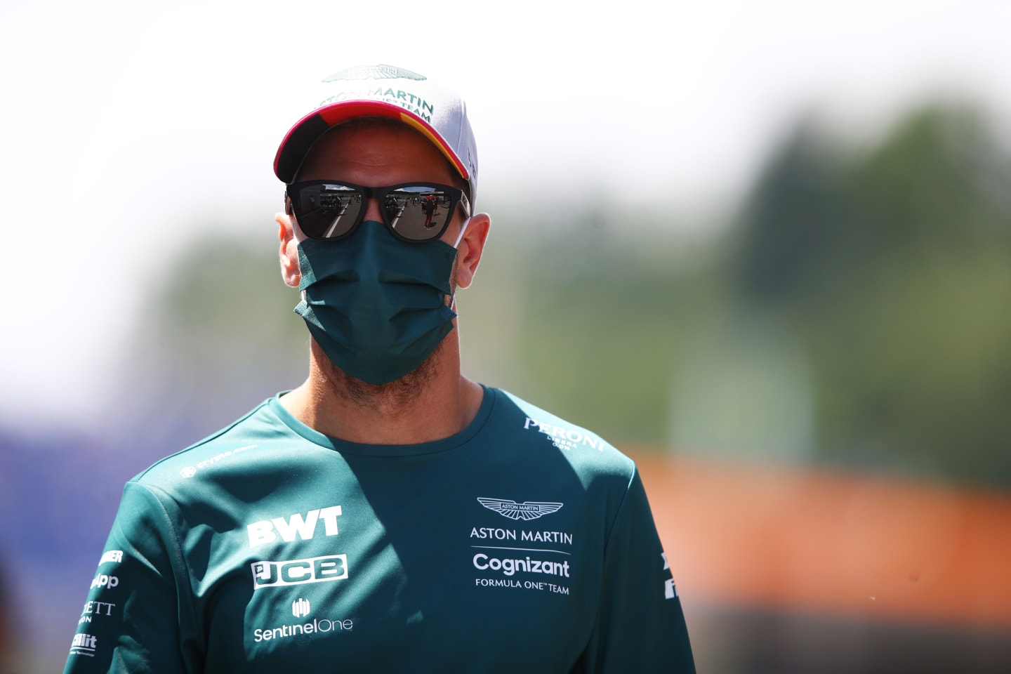 SPIELBERG, AUSTRIA - JUNE 27: Sebastian Vettel of Germany and Aston Martin F1 Team looks on from the drivers parade ahead of the F1 Grand Prix of Styria at Red Bull Ring on June 27, 2021 in Spielberg, Austria. (Photo by Mark Thompson/Getty Images)