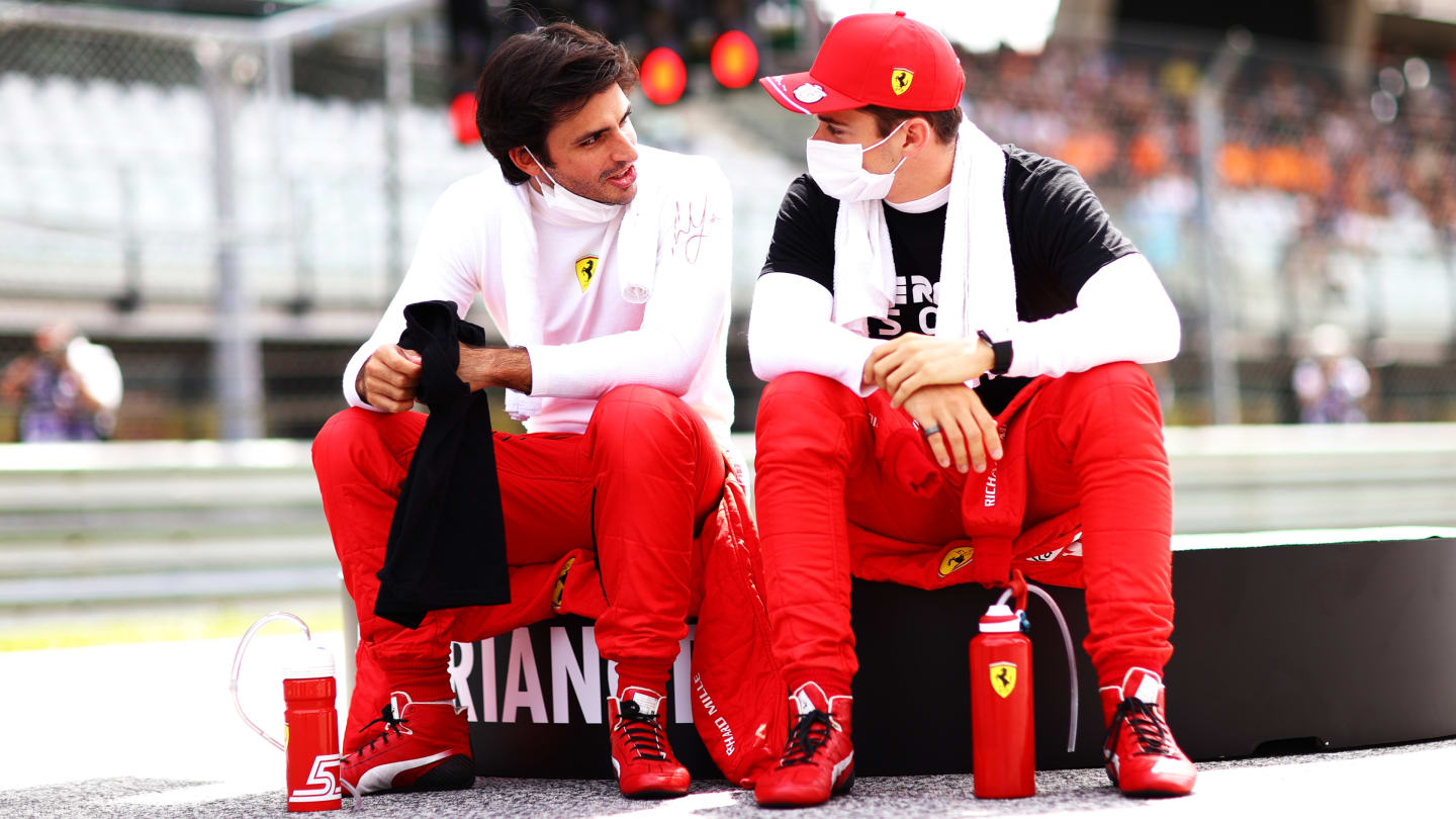 SPIELBERG, AUSTRIA - JUNE 27: Carlos Sainz of Spain and Ferrari and Charles Leclerc of Monaco and