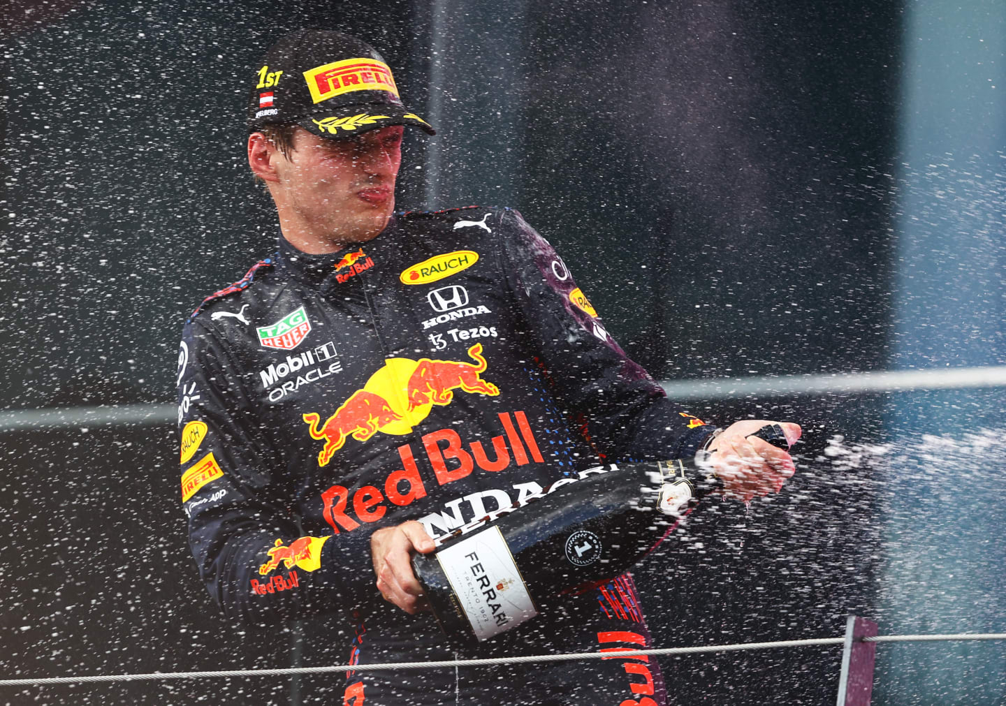 SPIELBERG, AUSTRIA - JUNE 27: Race winner Max Verstappen of Netherlands and Red Bull Racing celebrates on the podium during the F1 Grand Prix of Styria at Red Bull Ring on June 27, 2021 in Spielberg, Austria. (Photo by Bryn Lennon/Getty Images)