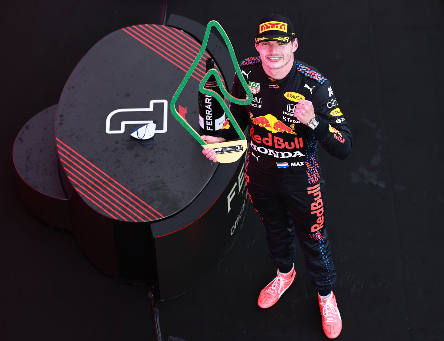 SPIELBERG, AUSTRIA - JUNE 27: Race winner Max Verstappen of Netherlands and Red Bull Racing celebrates on the podium during the F1 Grand Prix of Styria at Red Bull Ring on June 27, 2021 in Spielberg, Austria. (Photo by Mark Thompson/Getty Images)