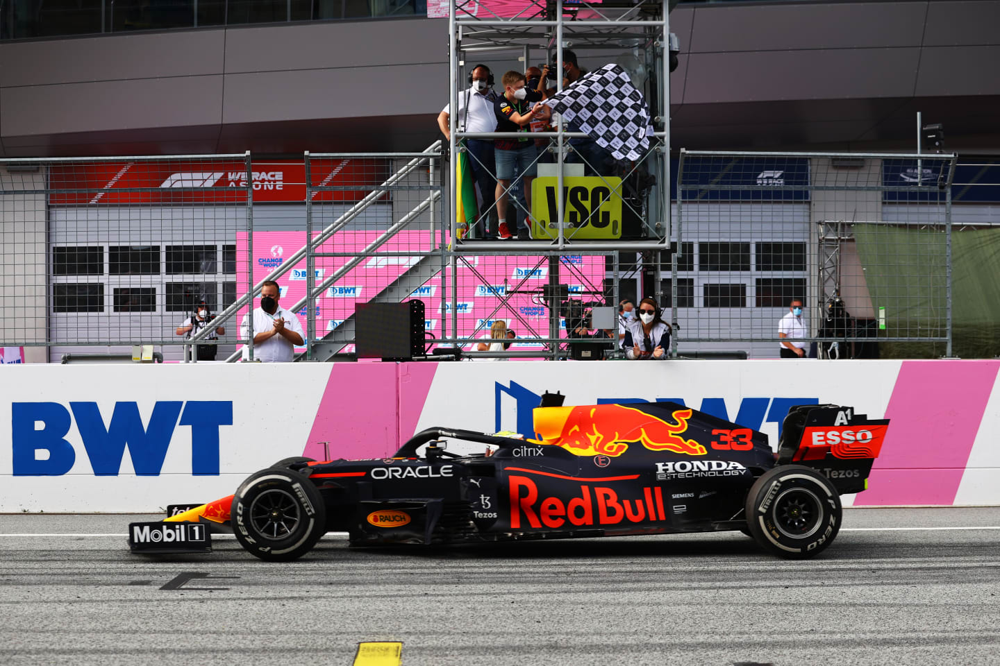 SPIELBERG, AUSTRIA - JUNE 27: Race winner Max Verstappen of the Netherlands driving the (33) Red Bull Racing RB16B Honda takes the chequered flag during the F1 Grand Prix of Styria at Red Bull Ring on June 27, 2021 in Spielberg, Austria. (Photo by Bryn Lennon/Getty Images)