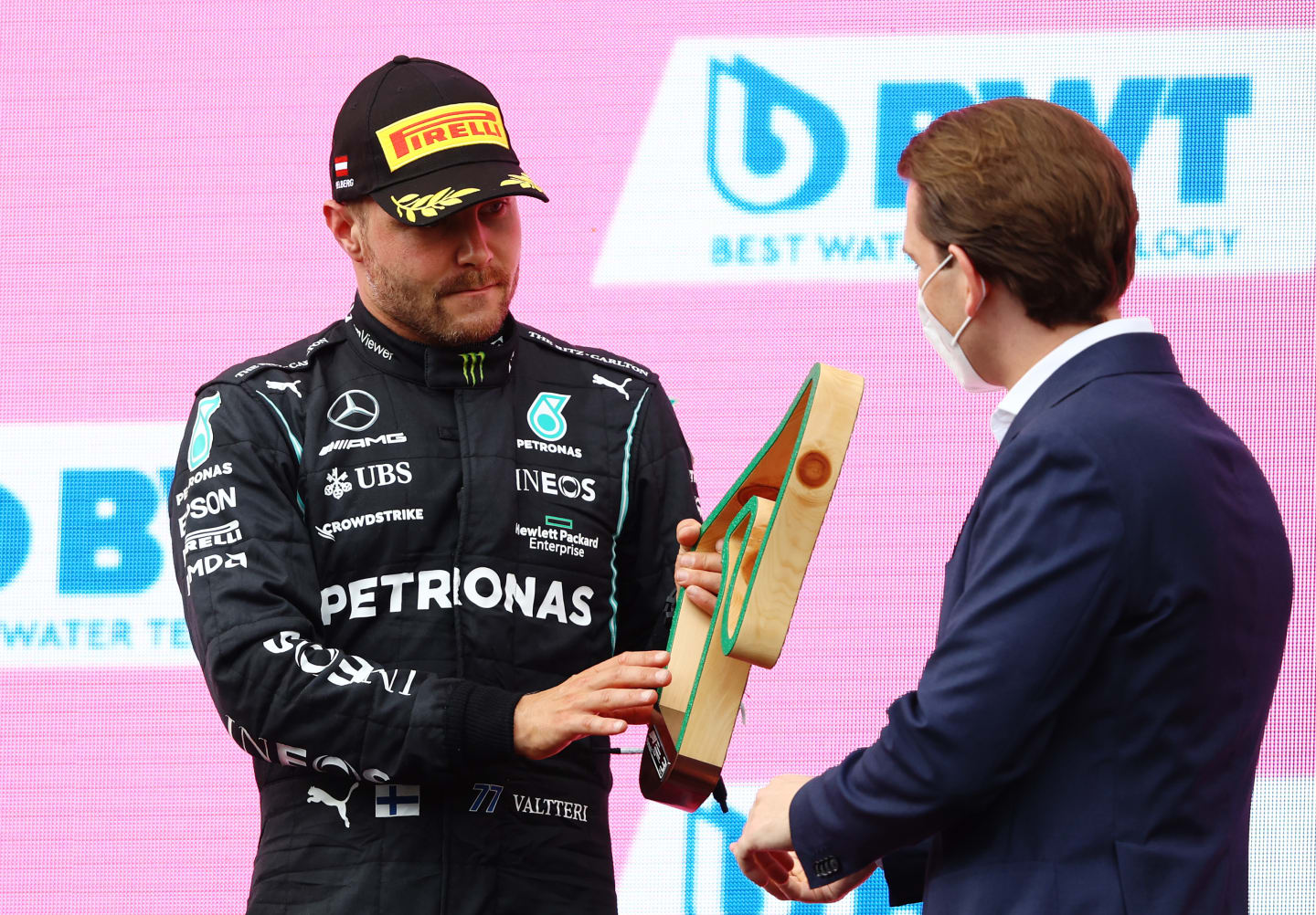 SPIELBERG, AUSTRIA - JUNE 27: Third placed Valtteri Bottas of Finland and Mercedes GP celebrates on the podium during the F1 Grand Prix of Styria at Red Bull Ring on June 27, 2021 in Spielberg, Austria. (Photo by Bryn Lennon/Getty Images)