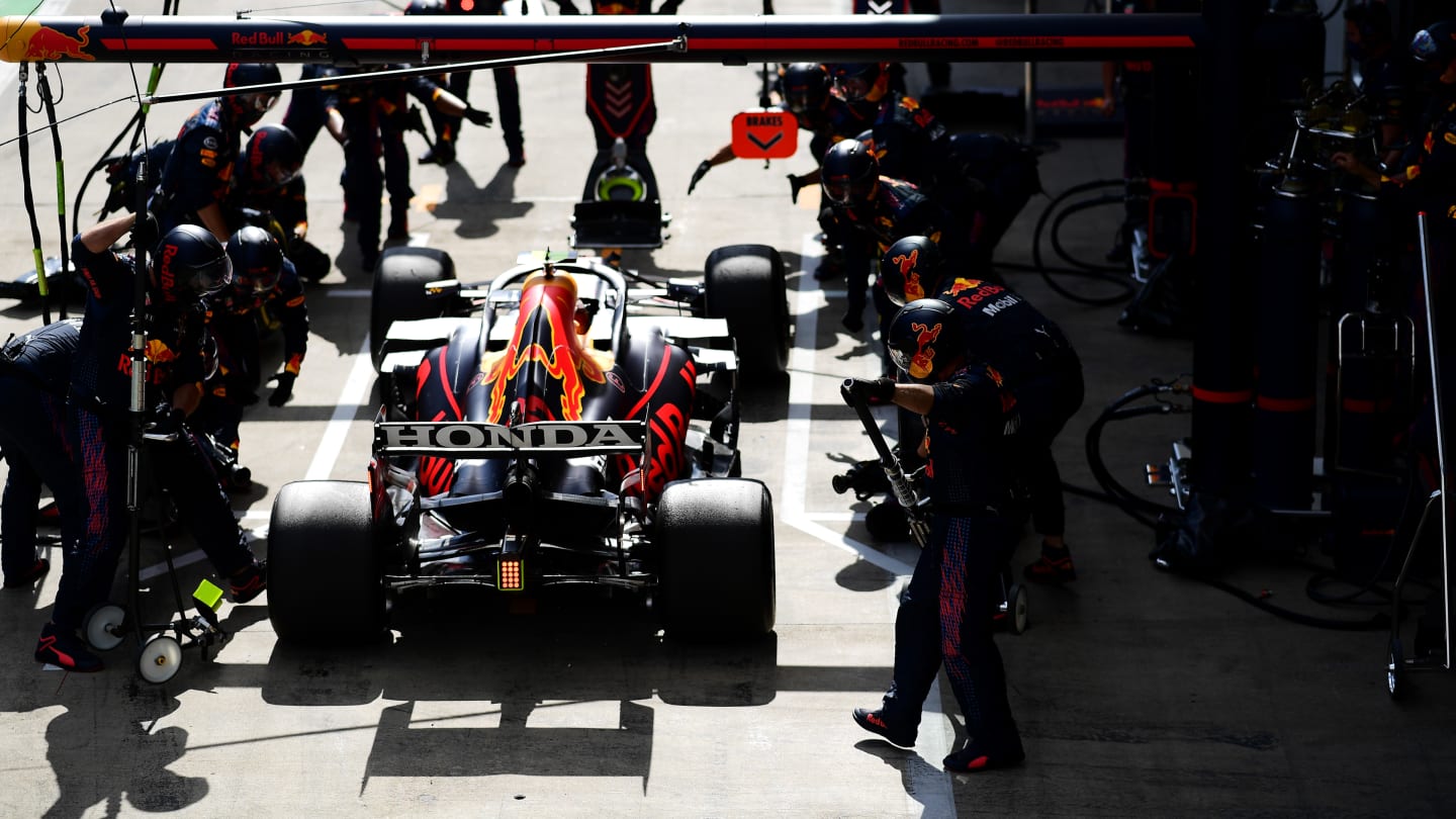 SPIELBERG, AUSTRIA - JUNE 27: Sergio Perez of Mexico driving the (11) Red Bull Racing RB16B Honda makes a pitstop during the F1 Grand Prix of Styria at Red Bull Ring on June 27, 2021 in Spielberg, Austria. (Photo by Mario Renzi - Formula 1/Formula 1 via Getty Images)