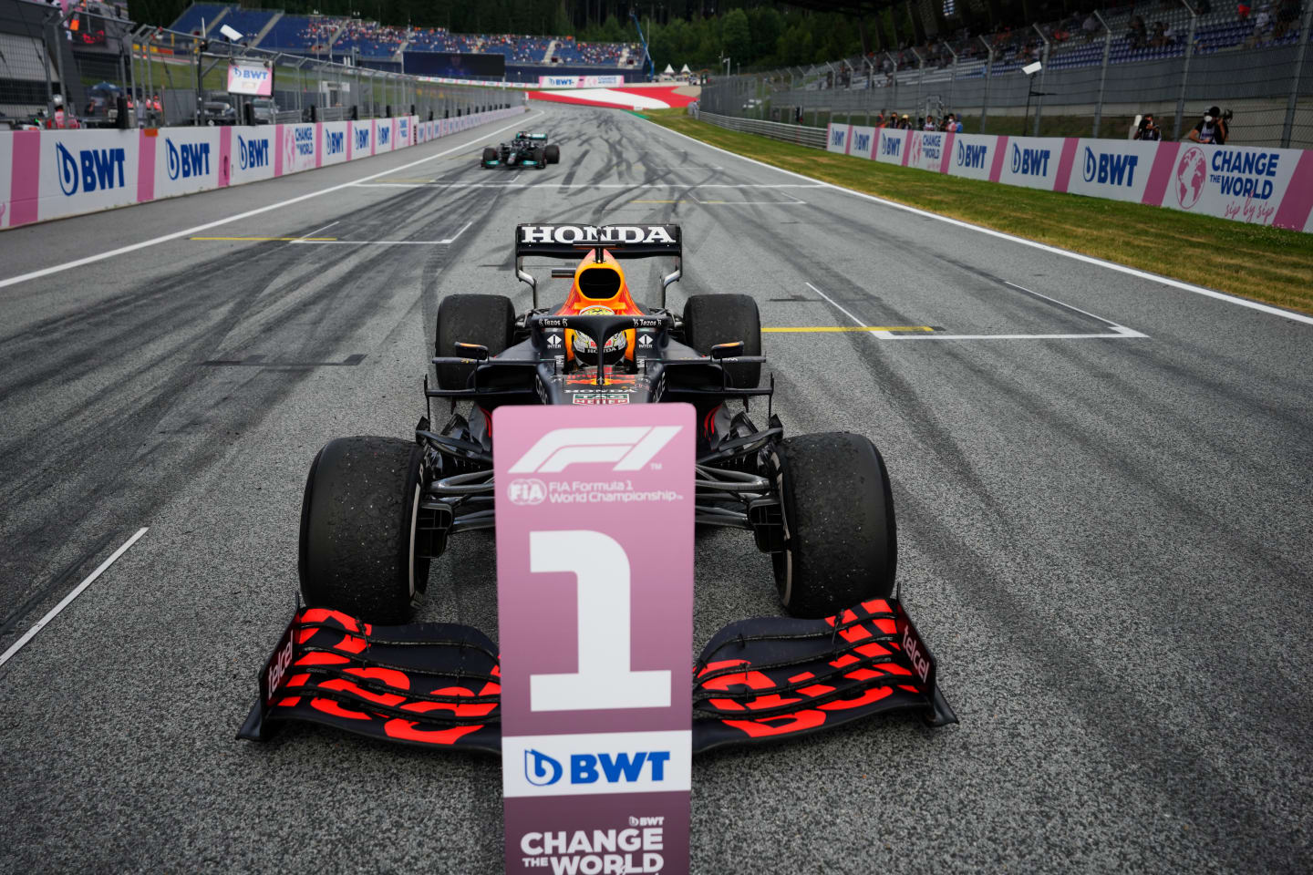 SPIELBERG, AUSTRIA - JUNE 27: Race winner Max Verstappen of Netherlands and Red Bull Racing stops