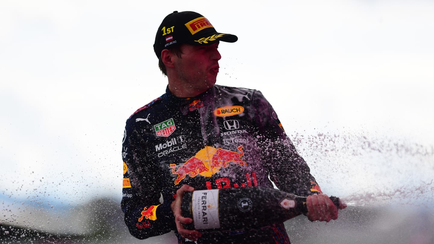 SPIELBERG, AUSTRIA - JUNE 27: Race winner Max Verstappen of Netherlands and Red Bull Racing celebrates on the podium during the F1 Grand Prix of Styria at Red Bull Ring on June 27, 2021 in Spielberg, Austria. (Photo by Mario Renzi - Formula 1/Formula 1 via Getty Images)