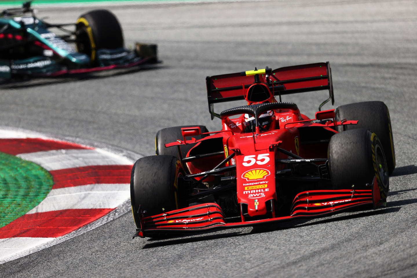 SPIELBERG, AUSTRIA - JUNE 27: Carlos Sainz of Spain driving the (55) Scuderia Ferrari SF21 during