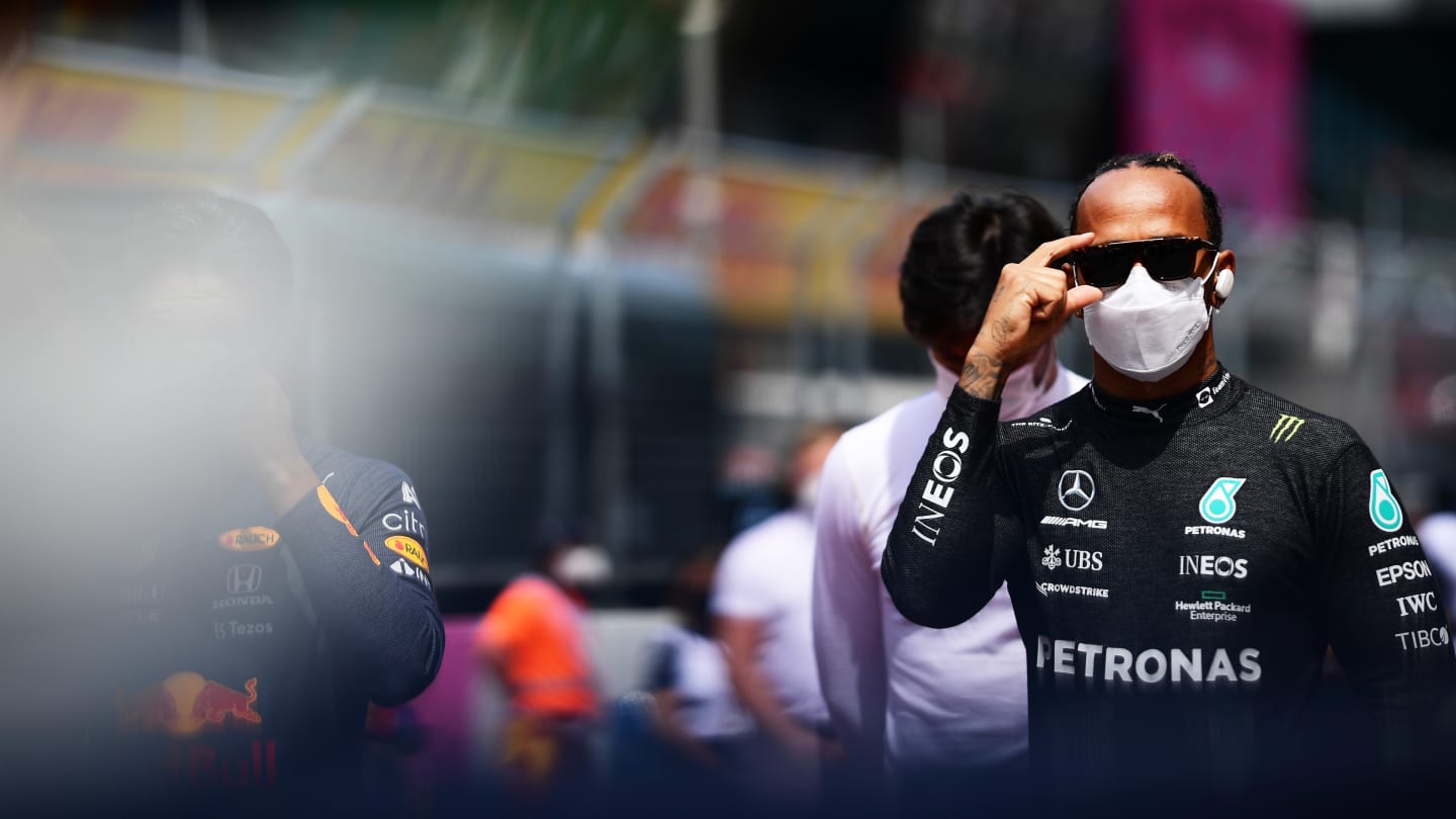SPIELBERG, AUSTRIA - JUNE 27: Lewis Hamilton of Great Britain and Mercedes GP looks on from the