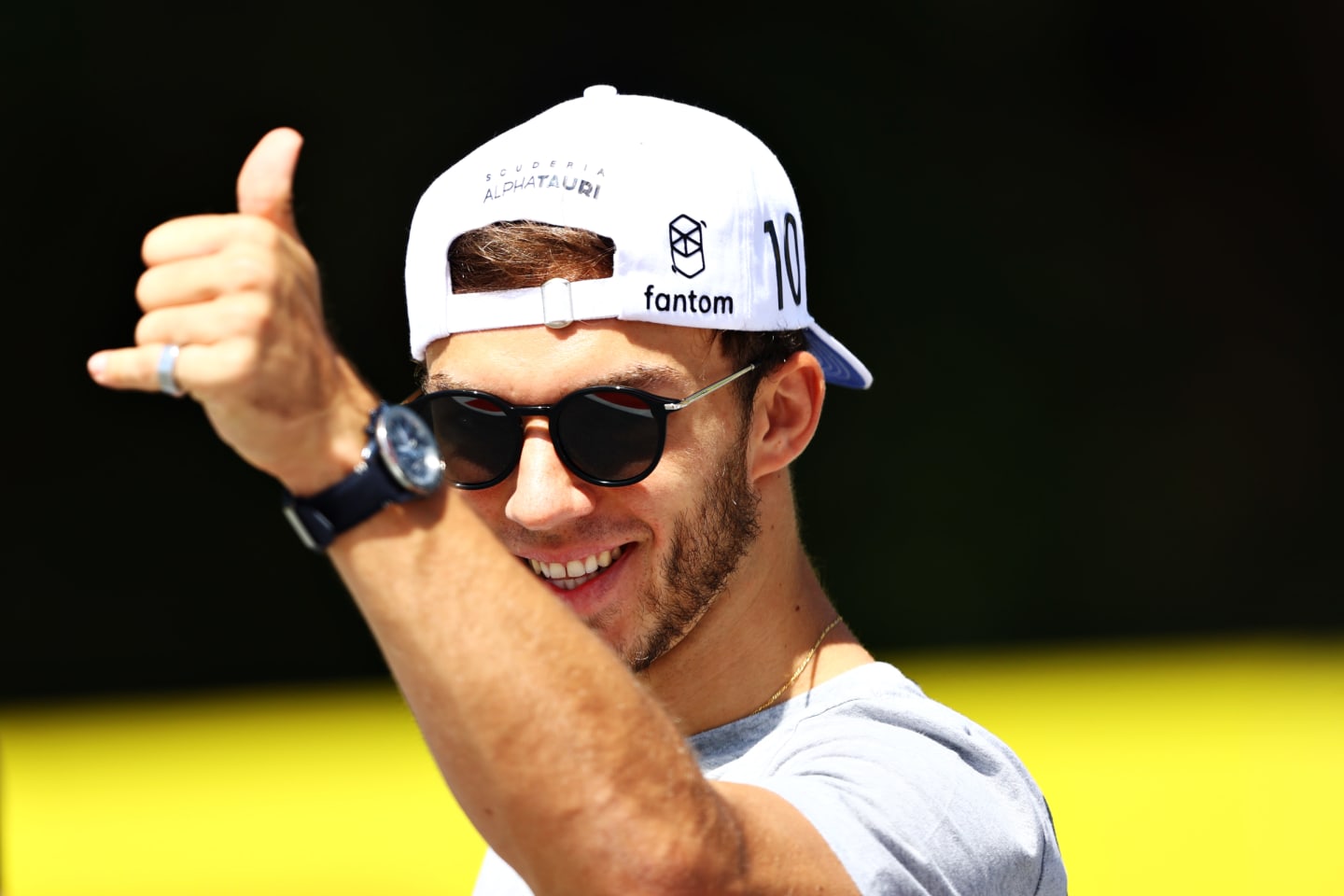 SPIELBERG, AUSTRIA - JUNE 24: Pierre Gasly of France and Scuderia AlphaTauri waves to the crowd on