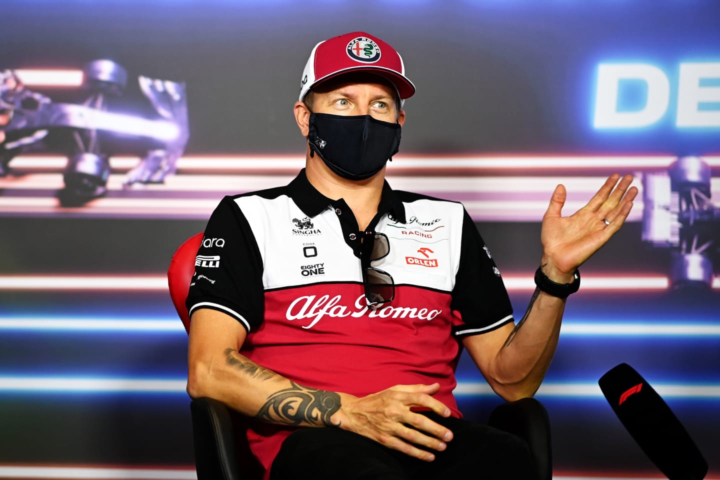 SPIELBERG, AUSTRIA - JUNE 24: Kimi Raikkonen of Finland and Alfa Romeo Racing talks in a Drivers