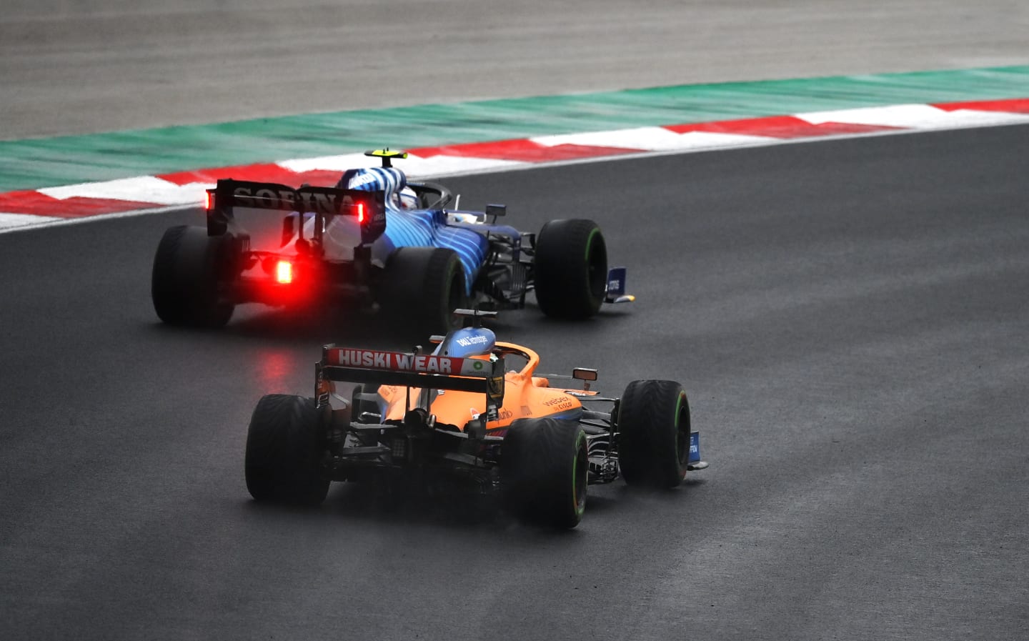 ISTANBUL, TURKEY - OCTOBER 10: Nicholas Latifi of Canada driving the (6) Williams Racing FW43B Mercedes leads Daniel Ricciardo of Australia driving the (3) McLaren F1 Team MCL35M Mercedes during the F1 Grand Prix of Turkey at Intercity Istanbul Park on October 10, 2021 in Istanbul, Turkey. (Photo by Dan Mullan/Getty Images)