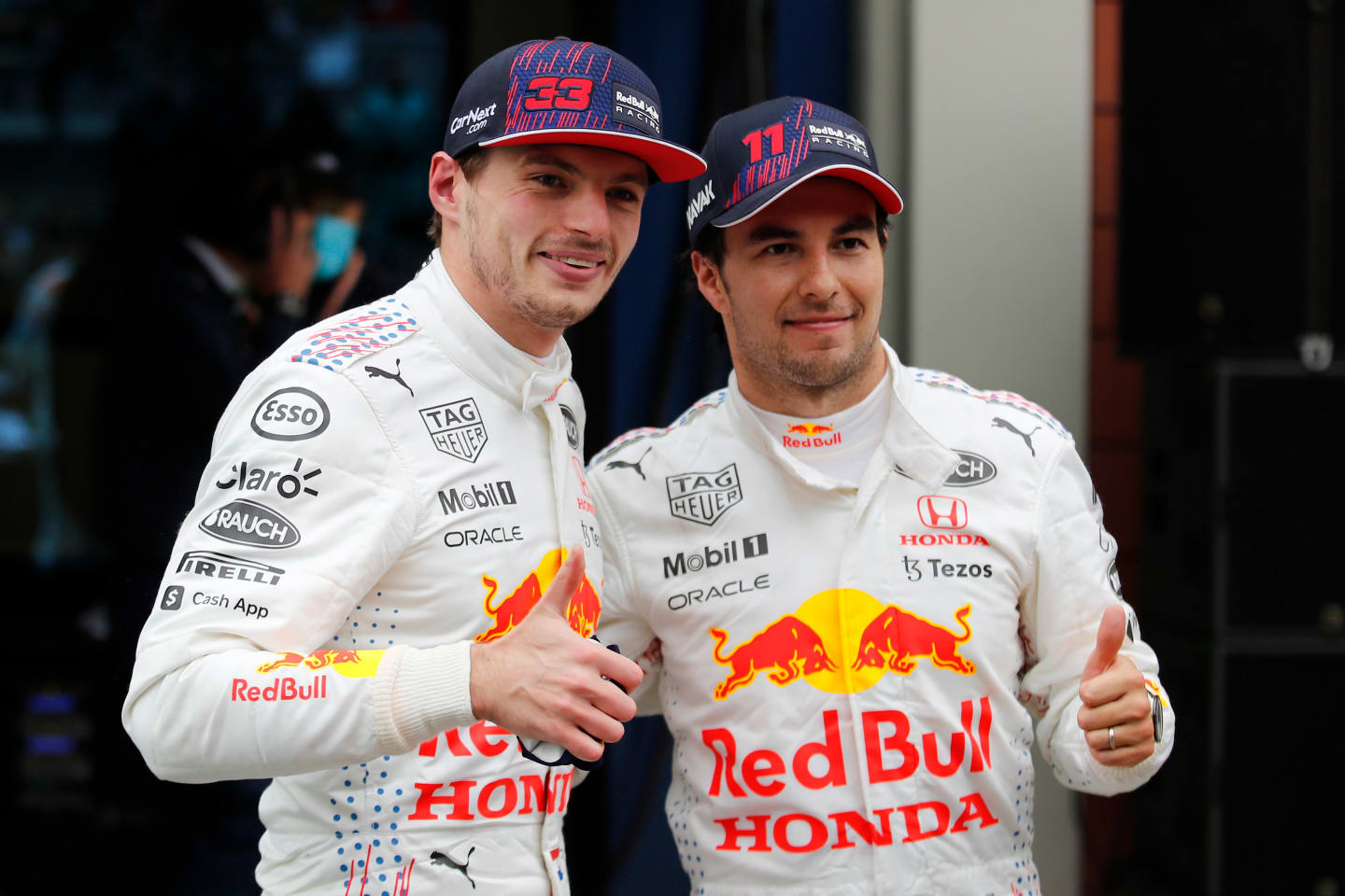 ISTANBUL, TURKEY - OCTOBER 10: Second placed Max Verstappen of Netherlands and Red Bull Racing and third placed Sergio Perez of Mexico and Red Bull Racing celebrate in parc ferme during the F1 Grand Prix of Turkey at Intercity Istanbul Park on October 10, 2021 in Istanbul, Turkey. (Photo by Umit Bektas - Pool/Getty Images)
