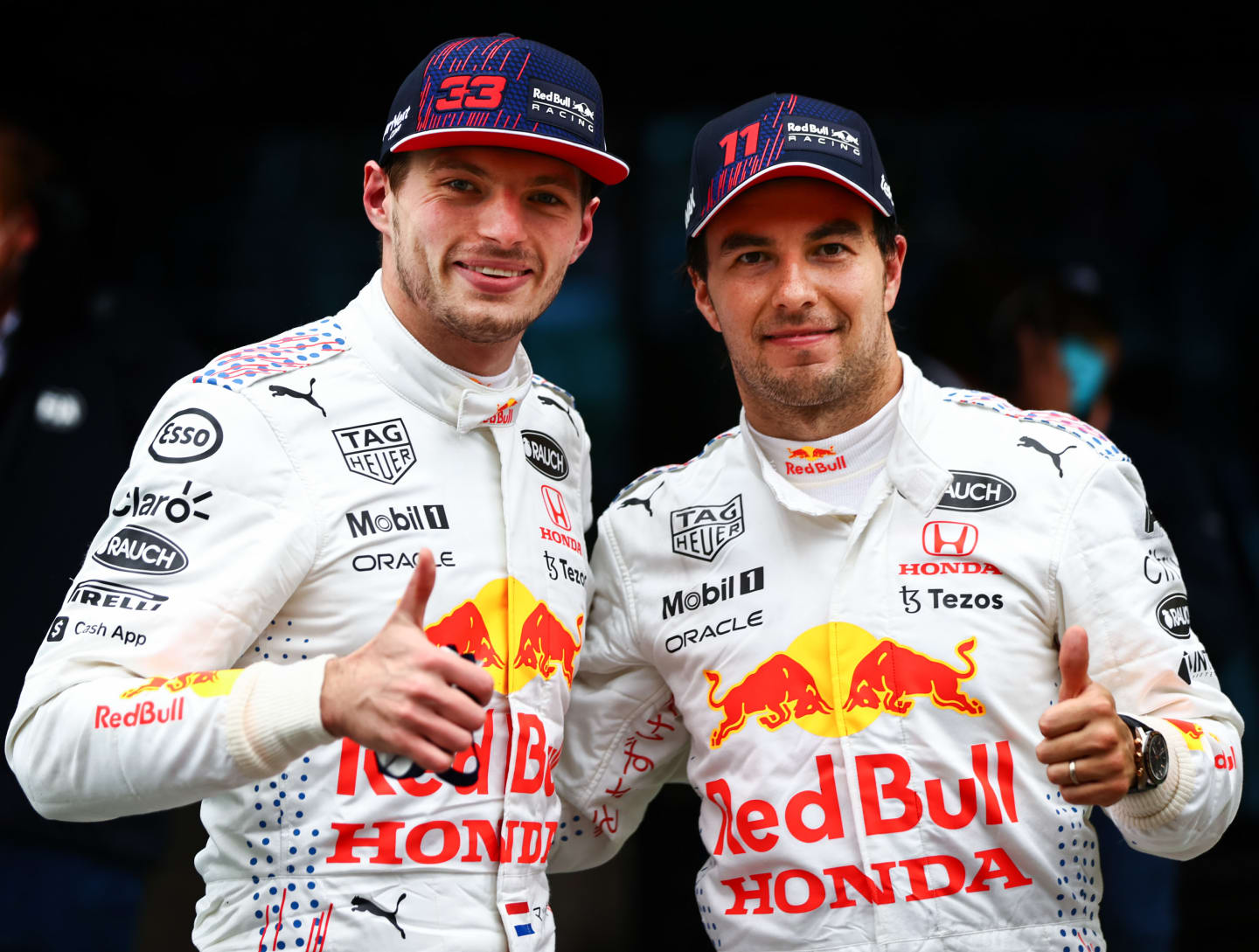 ISTANBUL, TURKEY - OCTOBER 10: Second placed Max Verstappen of Netherlands and Red Bull Racing and third placed Sergio Perez of Mexico and Red Bull Racing celebrate in parc ferme during the F1 Grand Prix of Turkey at Intercity Istanbul Park on October 10, 2021 in Istanbul, Turkey. (Photo by Mark Thompson/Getty Images)
