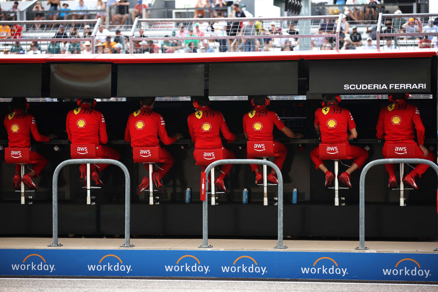 AUSTIN, TEXAS - OCTOBER 23: The Ferrari team work on the pitwall during final practice ahead of the