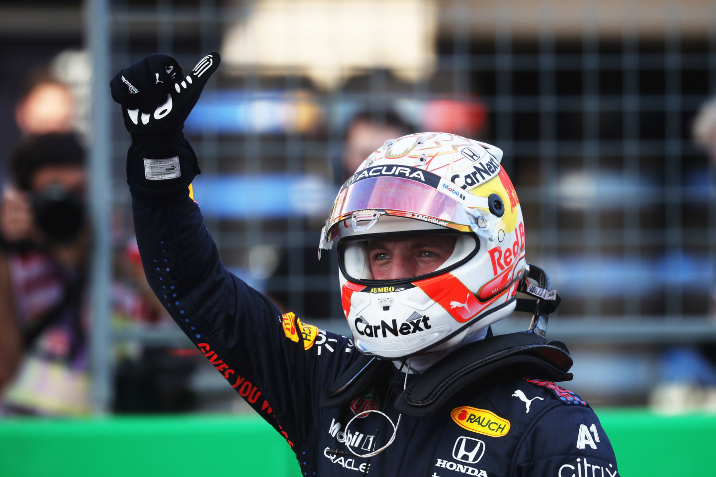 AUSTIN, TEXAS - OCTOBER 23: Pole position qualifier Max Verstappen of Netherlands and Red Bull Racing celebrates in parc ferme during qualifying ahead of the F1 Grand Prix of USA at Circuit of The Americas on October 23, 2021 in Austin, Texas. (Photo by Chris Graythen/Getty Images)