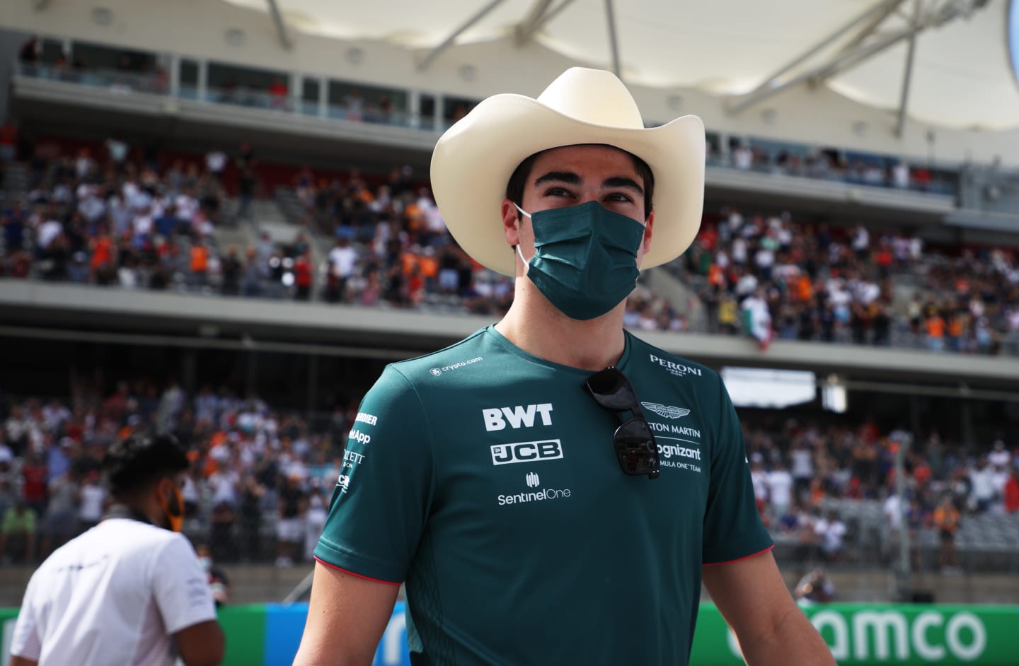 AUSTIN, TEXAS - OCTOBER 24: Lance Stroll of Canada and Aston Martin F1 Team walks in the Paddock before the F1 Grand Prix of USA at Circuit of The Americas on October 24, 2021 in Austin, Texas. (Photo by Chris Graythen/Getty Images)