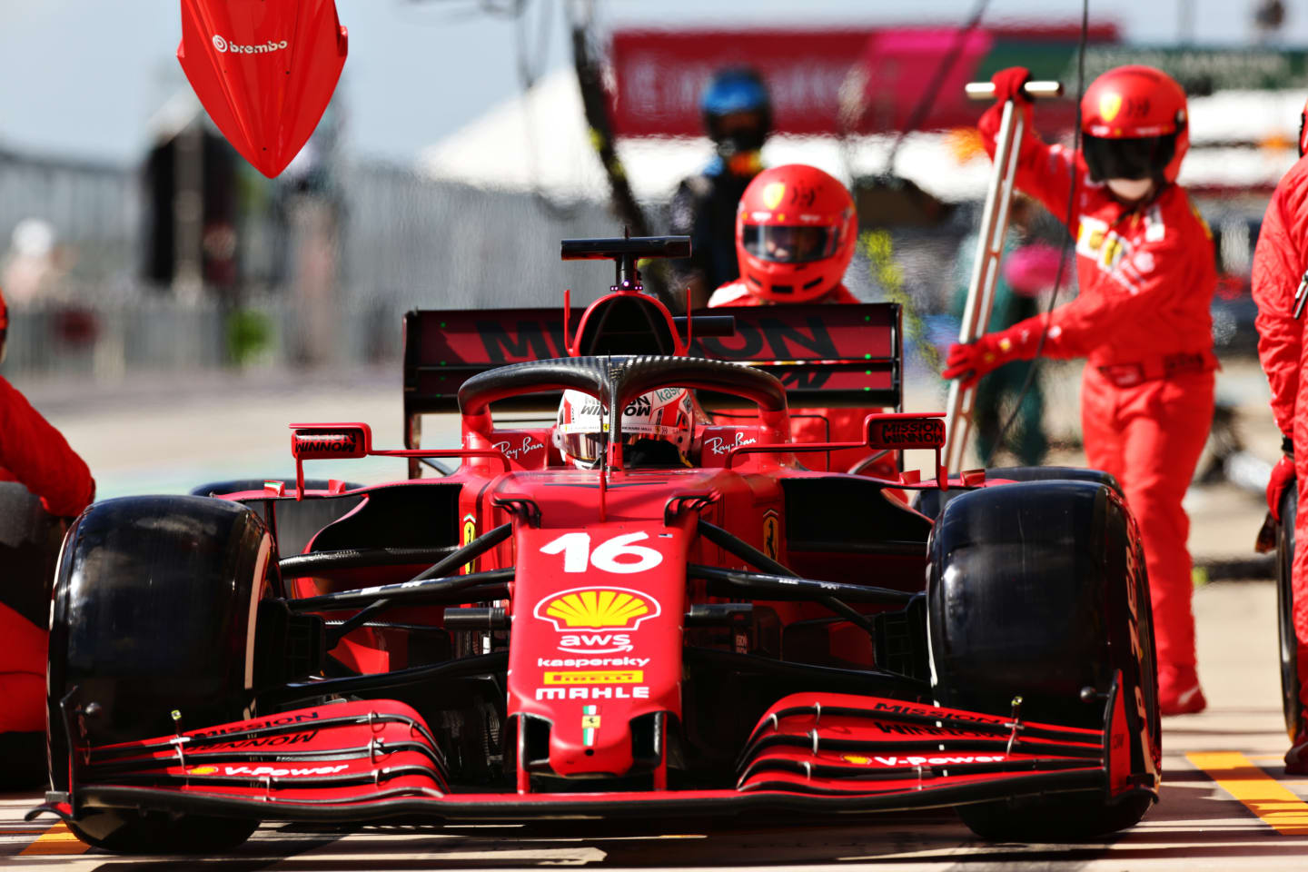 AUSTIN, TEXAS - OCTOBER 24: Charles Leclerc of Monaco driving the (16) Scuderia Ferrari SF21 makes